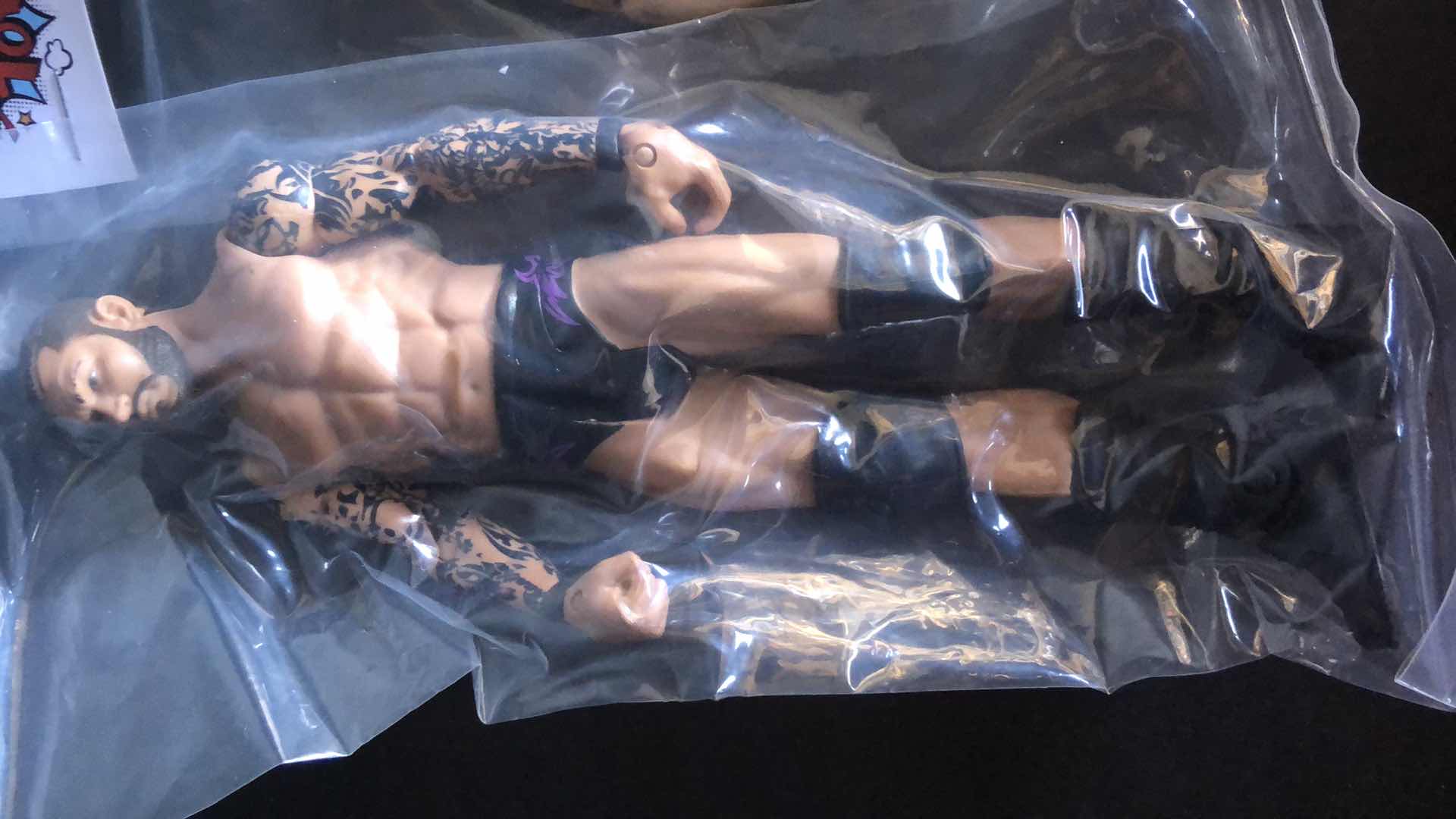 Photo 2 of ASSORTMENT OF UNBOXED WRESTLING ACTION FIGURES (4)