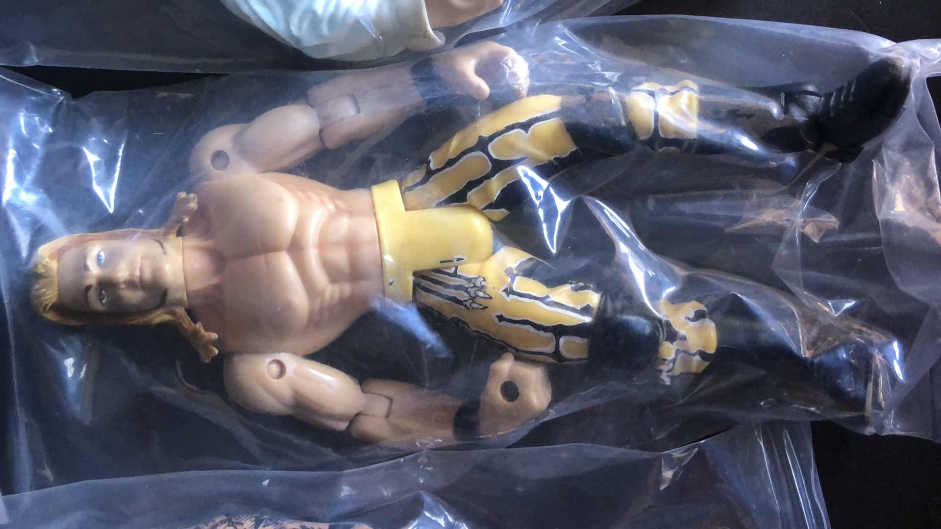 Photo 3 of ASSORTMENT OF UNBOXED WRESTLING ACTION FIGURES (4)