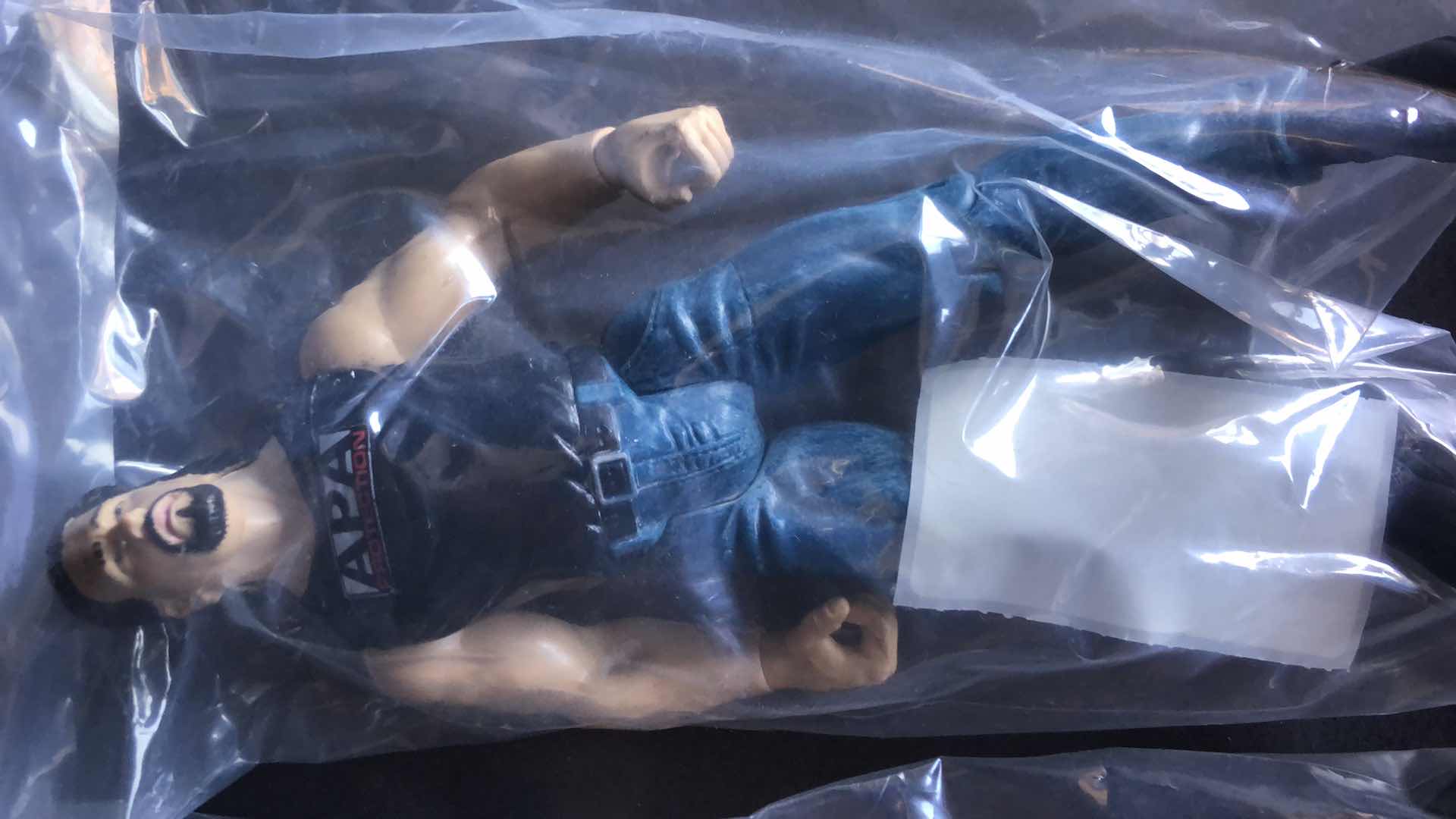 Photo 5 of ASSORTMENT OF UNBOXED WRESTLING ACTION FIGURES (4)