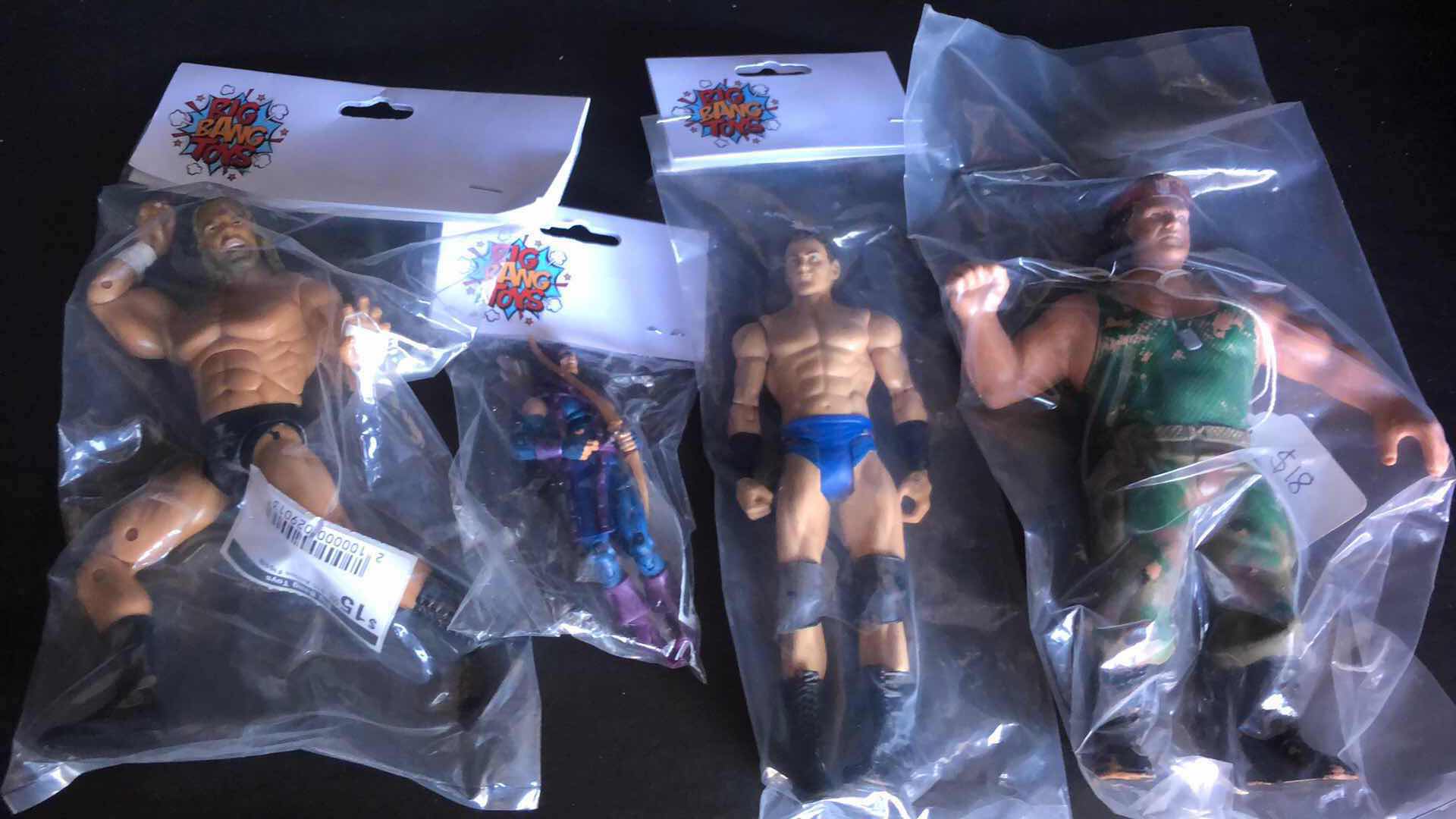 Photo 1 of ASSORTMENT OF UNBOXED WRESTLING ACTION FIGURES (4)