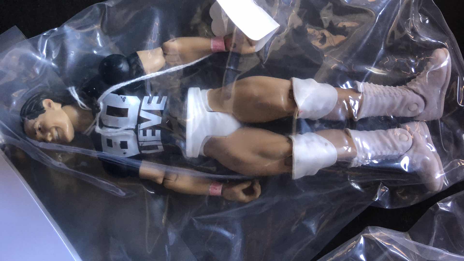 Photo 5 of ASSORTMENT OF UNBOXED WRESTLING ACTION FIGURES (4)