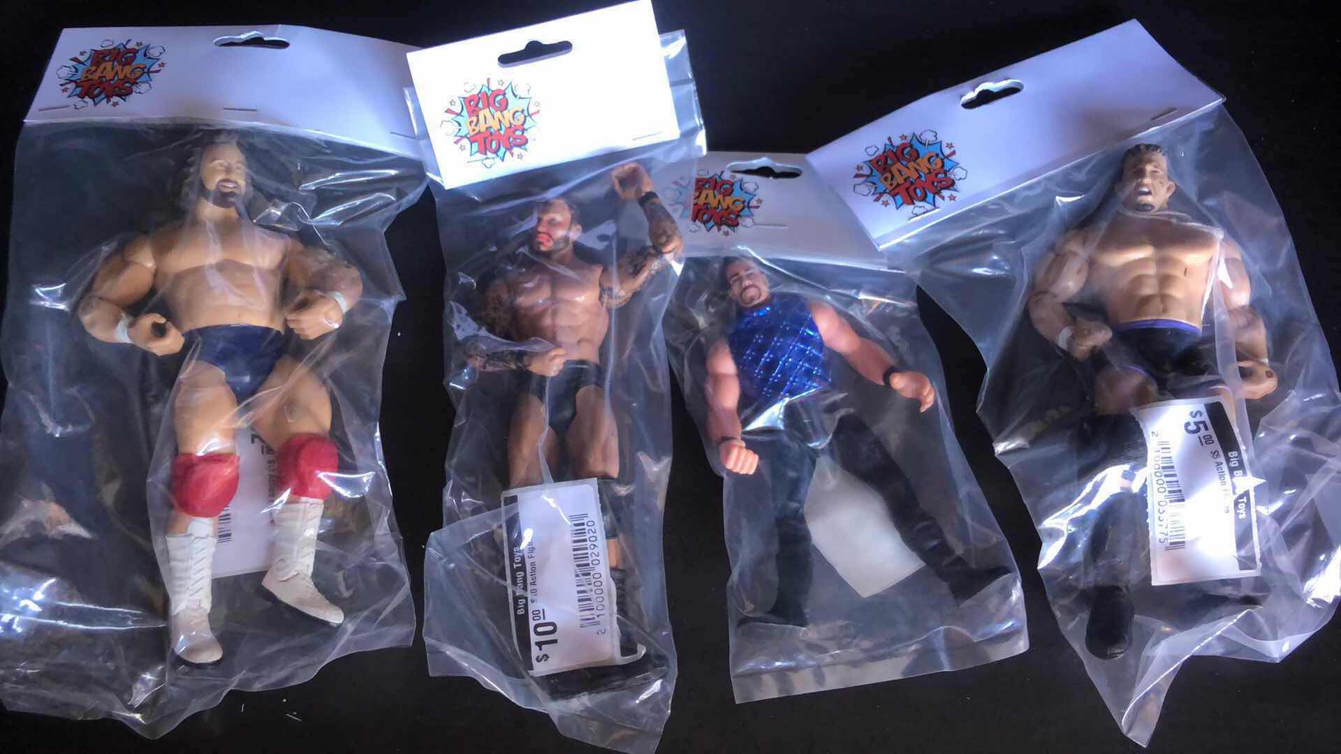 Photo 1 of ASSORTMENT OF UNBOXED WRESTLING ACTION FIGURES (4)