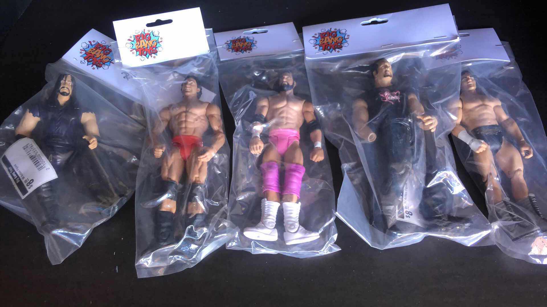 Photo 1 of ASSORTMENT OF UNBOXED WRESTLING ACTION FIGURES (5)