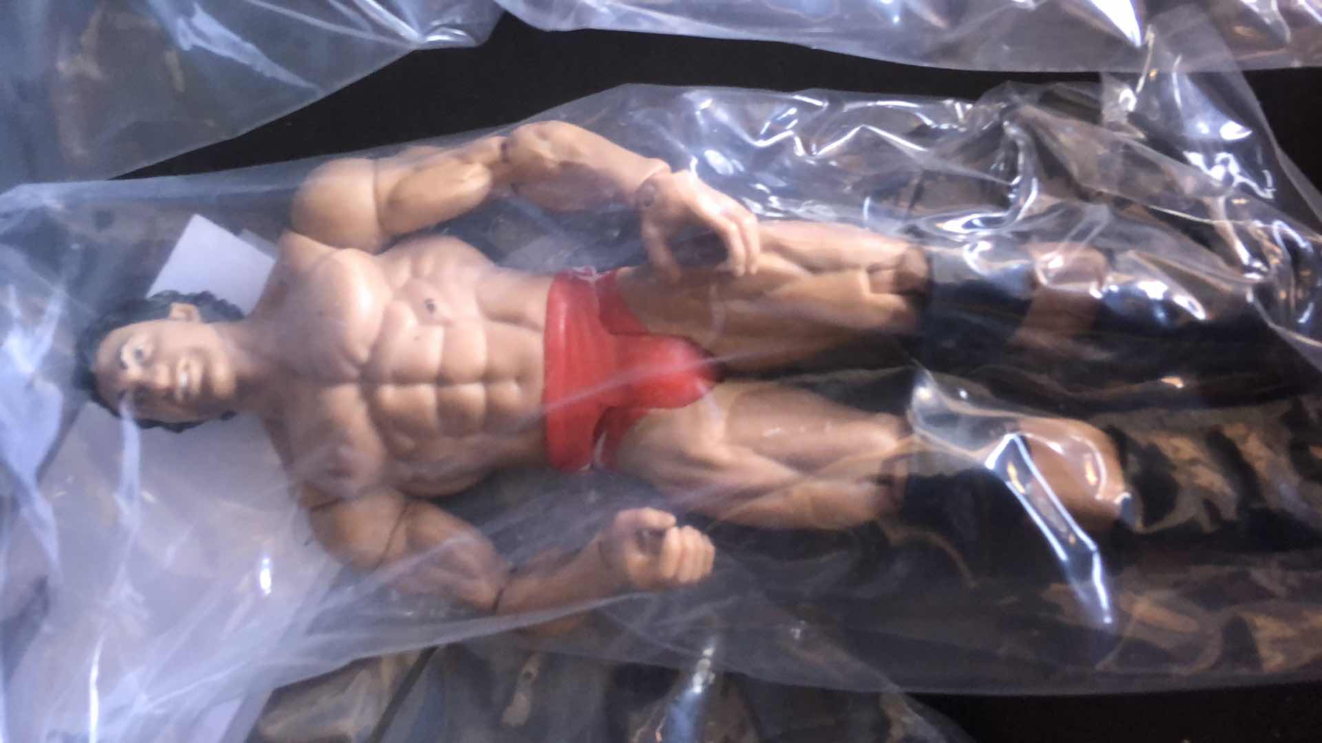 Photo 3 of ASSORTMENT OF UNBOXED WRESTLING ACTION FIGURES (5)