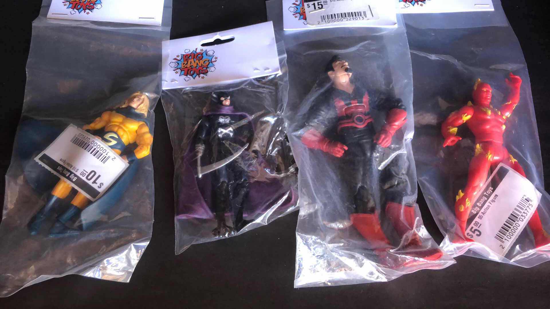 Photo 1 of ASSORTMENT OF UNBOXED SUPER HERO ACTION FIGURES (4)