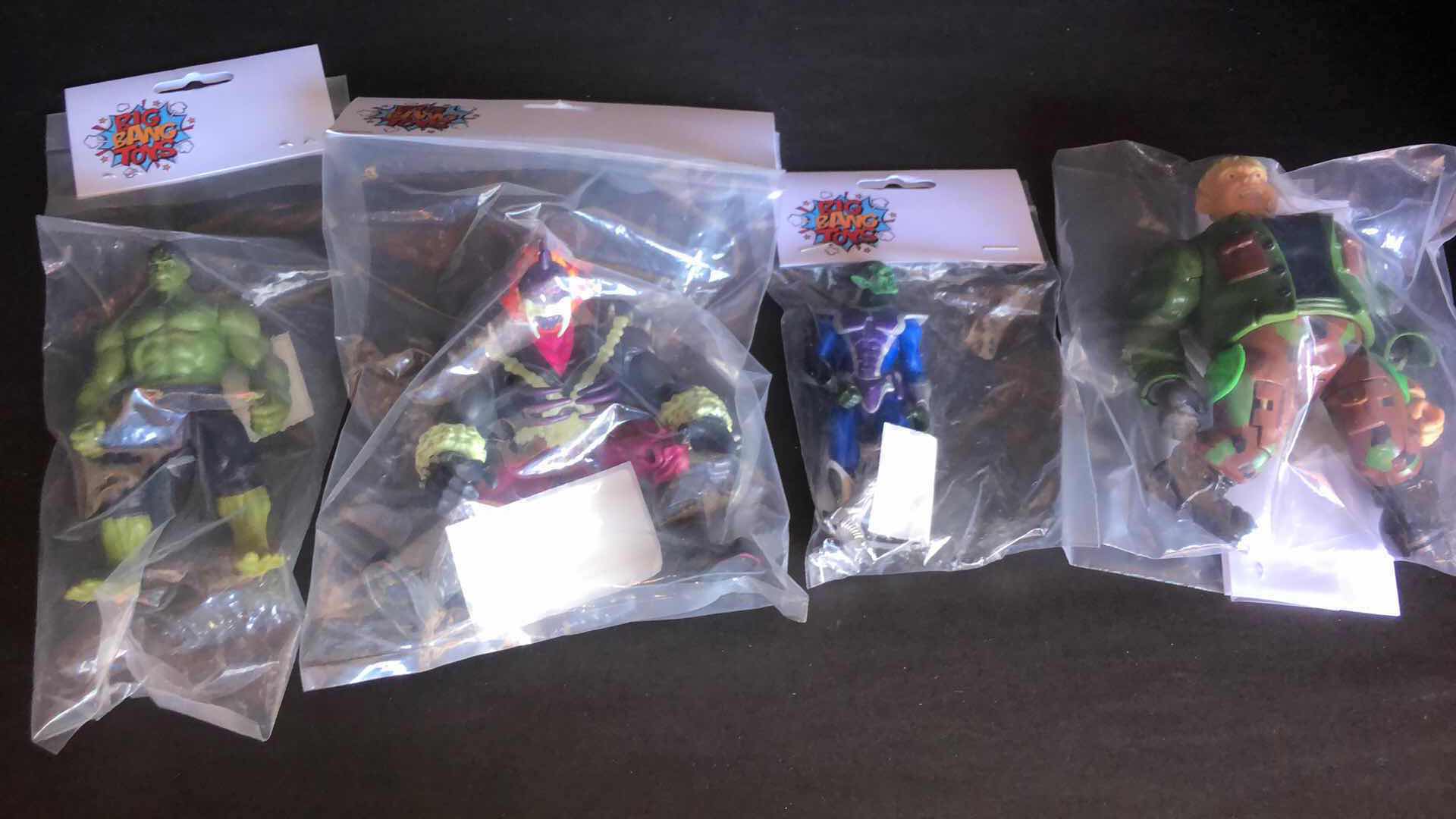 Photo 1 of ASSORTMENT OF UNBOXED SUPER HERO ACTION FIGURES (4)