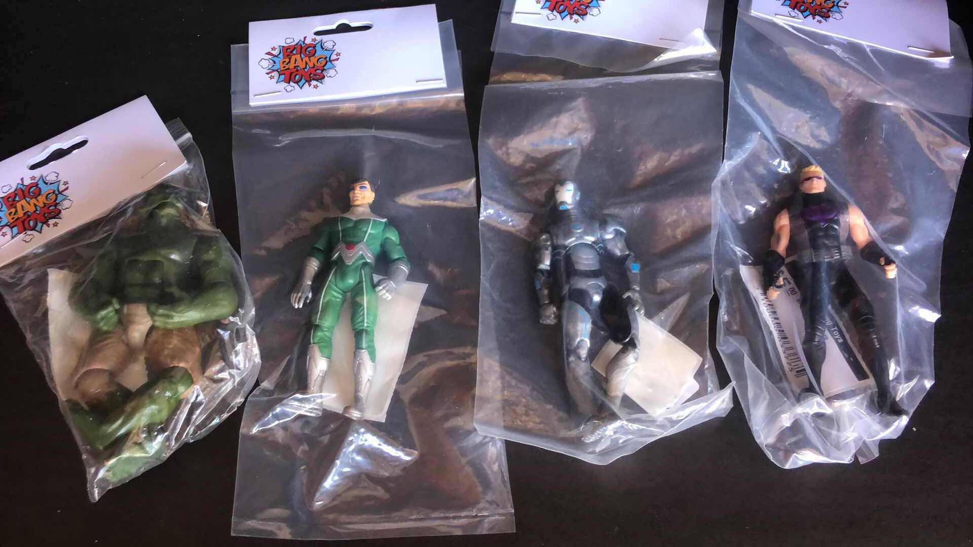 Photo 1 of ASSORTMENT OF UNBOXED SUPER HERO ACTION FIGURES (4)