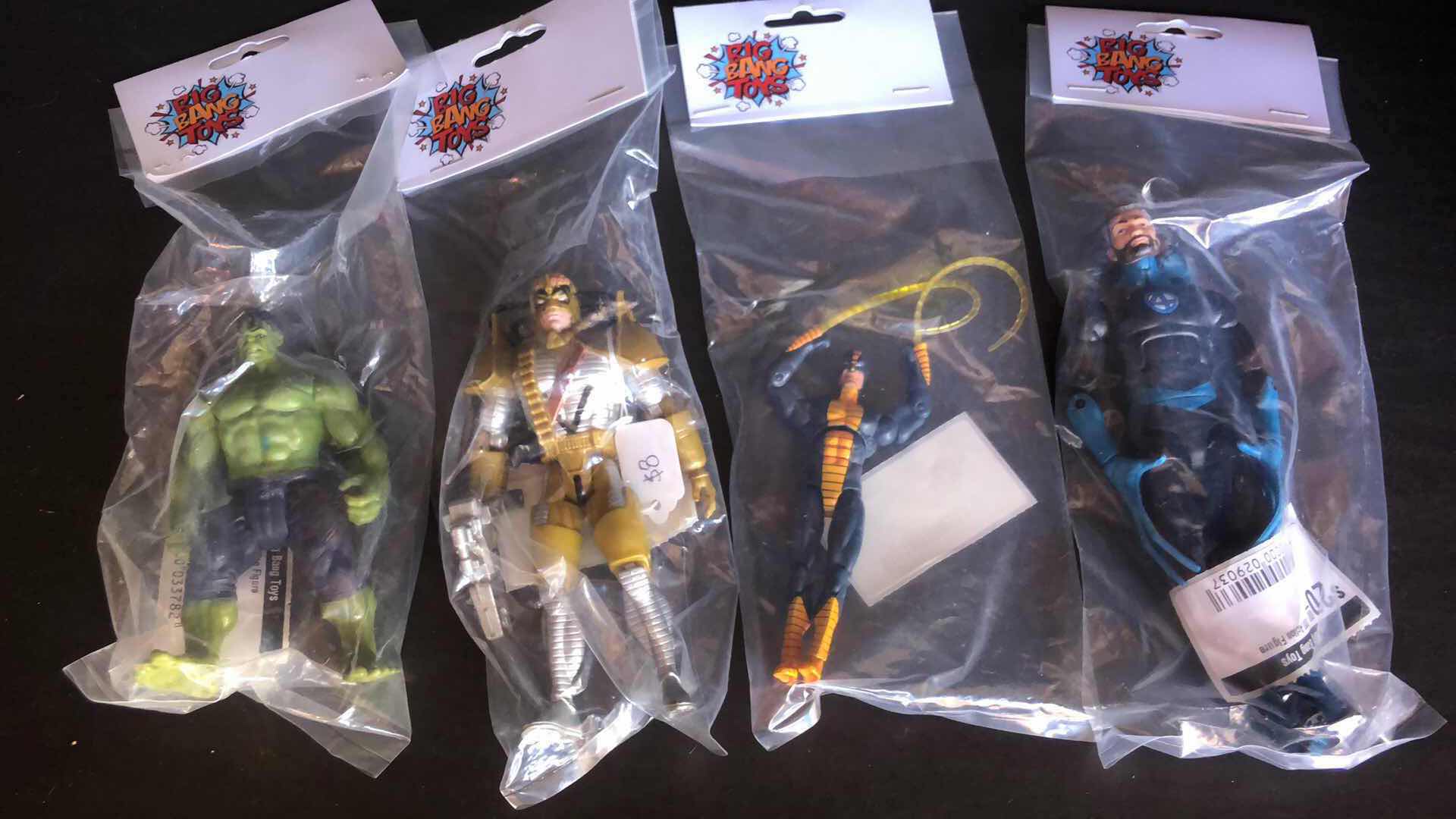 Photo 1 of ASSORTMENT OF UNBOXED SUPER HERO ACTION FIGURES (4)