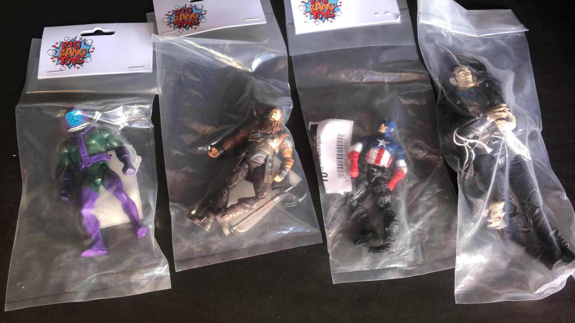 Photo 1 of ASSORTMENT OF UNBOXED SUPER HERO ACTION FIGURES (4)