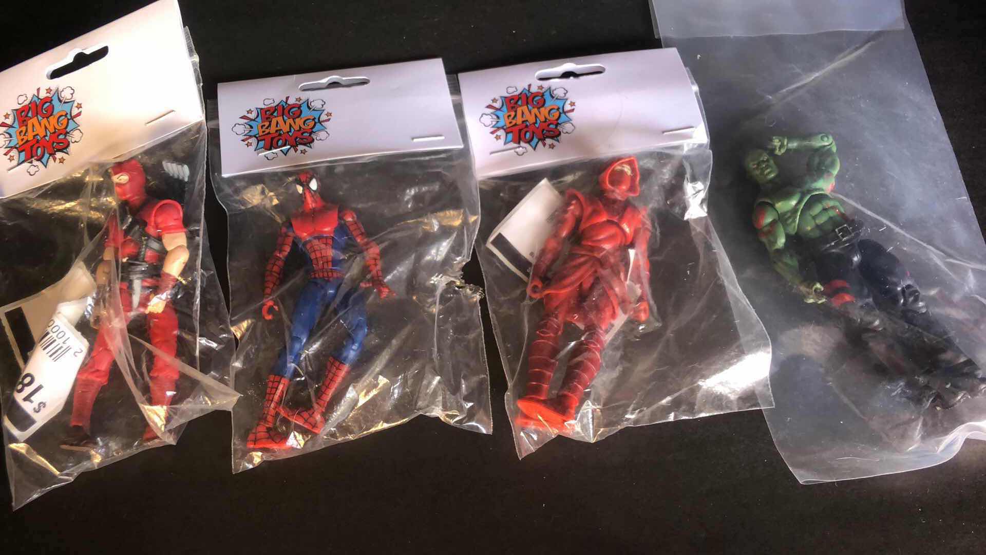 Photo 1 of ASSORTMENT OF UNBOXED SUPER HERO ACTION FIGURES (4)