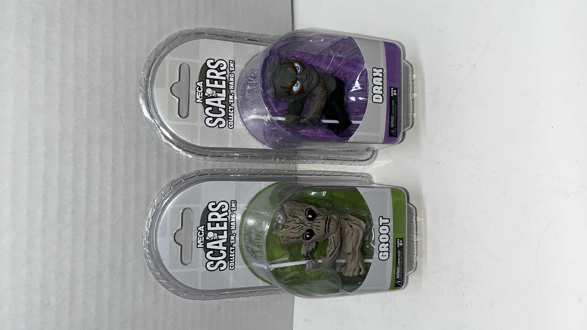 Photo 1 of NIP NECA SCALERS CORD ATTACHMENTS, GUARDIANS OF THE GALAXY GROOT & DRAX (2)