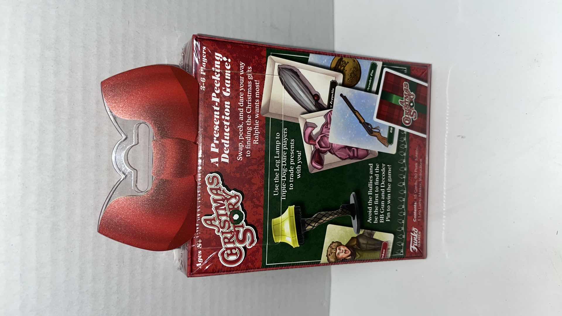 Photo 3 of BRAND NEW FUNKO GAMES A CHRISTMAS STORY “A MAJOR CARD GAME” & NECA A CHRISTMAS STORY LEG LAMP TALKING KEYCHAIN (2)