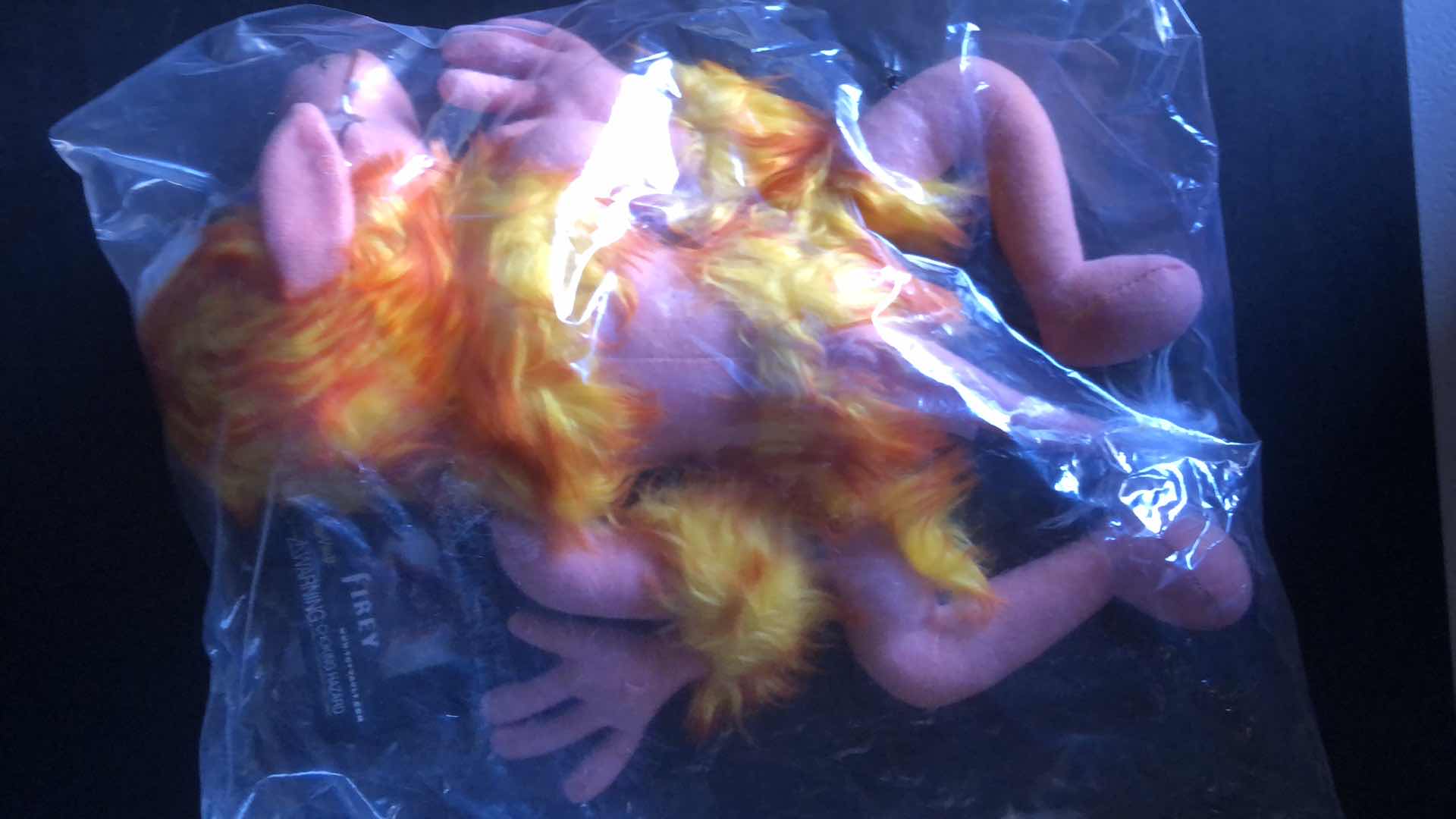 Photo 2 of SEALED TOY VAULT FIREY PLUSHY FROM LABRYNTH