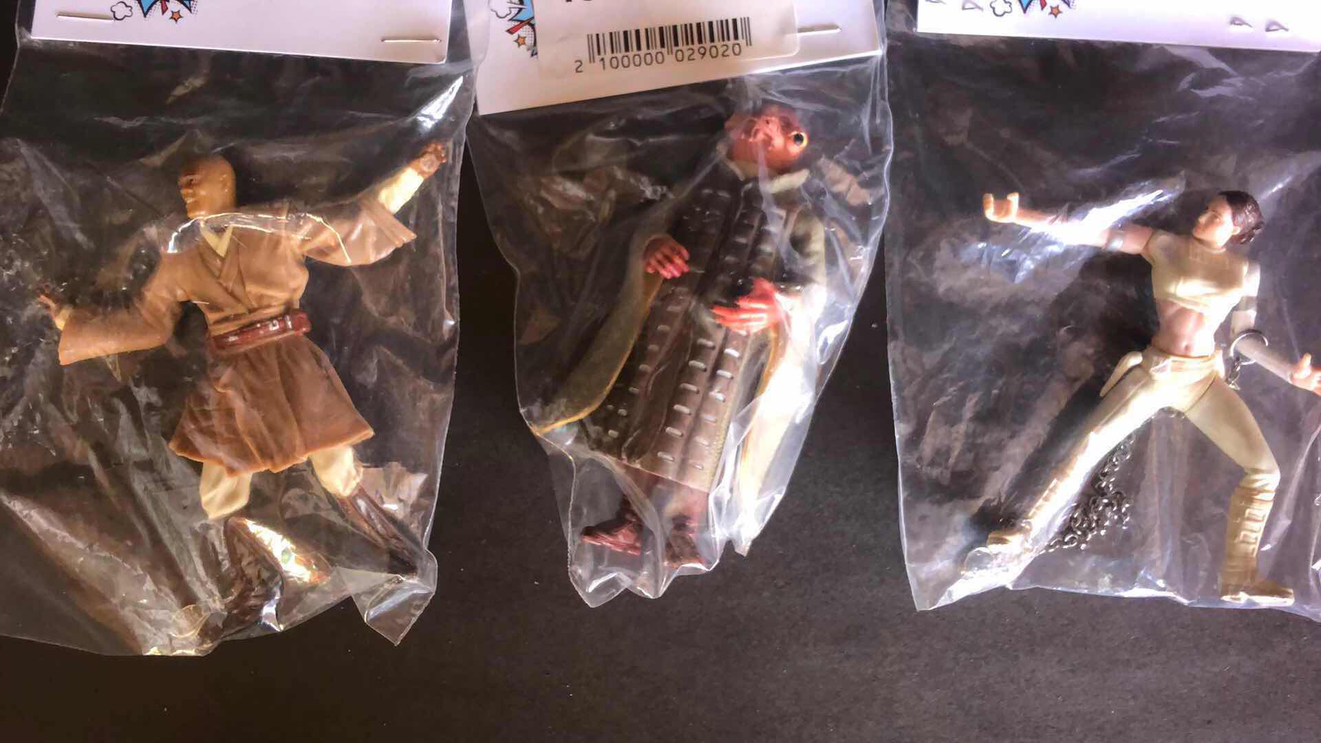 Photo 1 of ASSORTMENT OF UNBOXED ACTION FIGURES STOCKING STUFFERS (3)