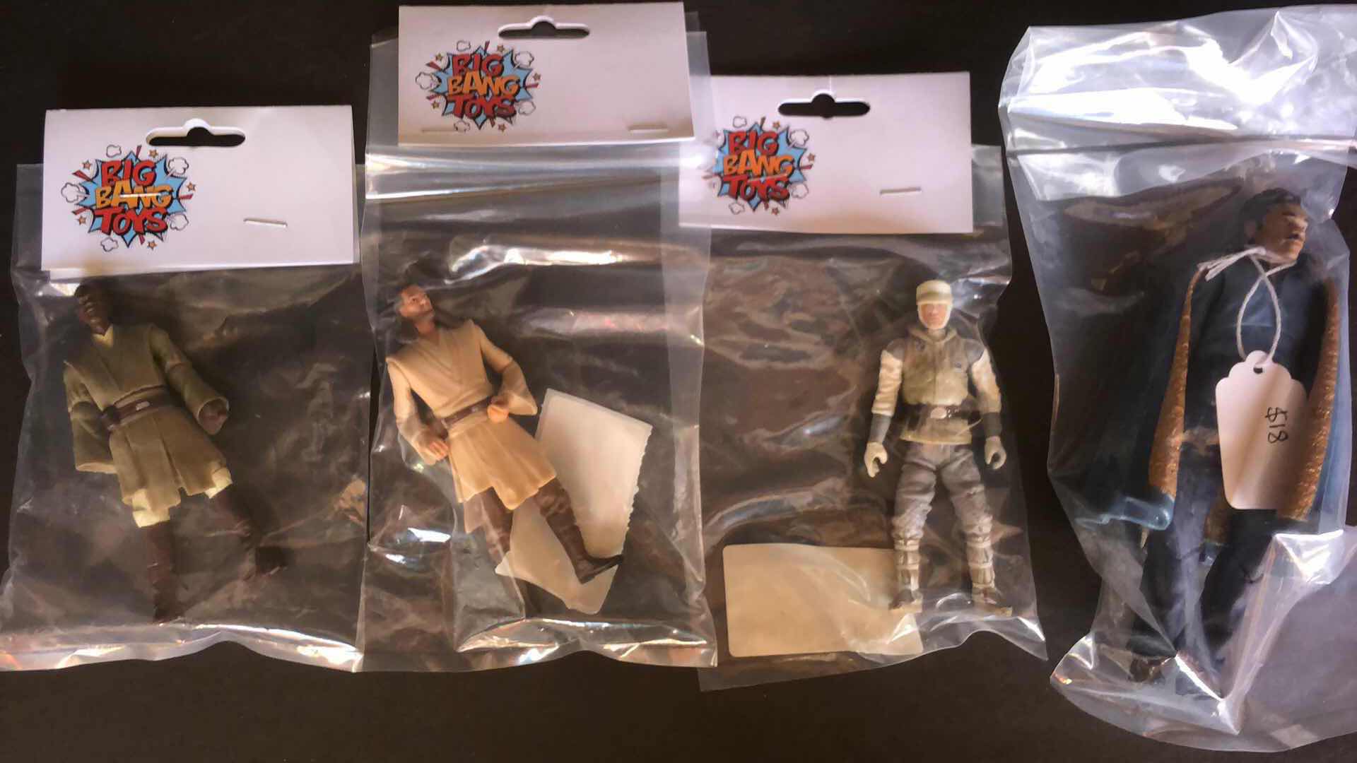Photo 1 of ASSORTMENT OF UNBOXED ACTION FIGURES STOCKING STUFFERS (4)