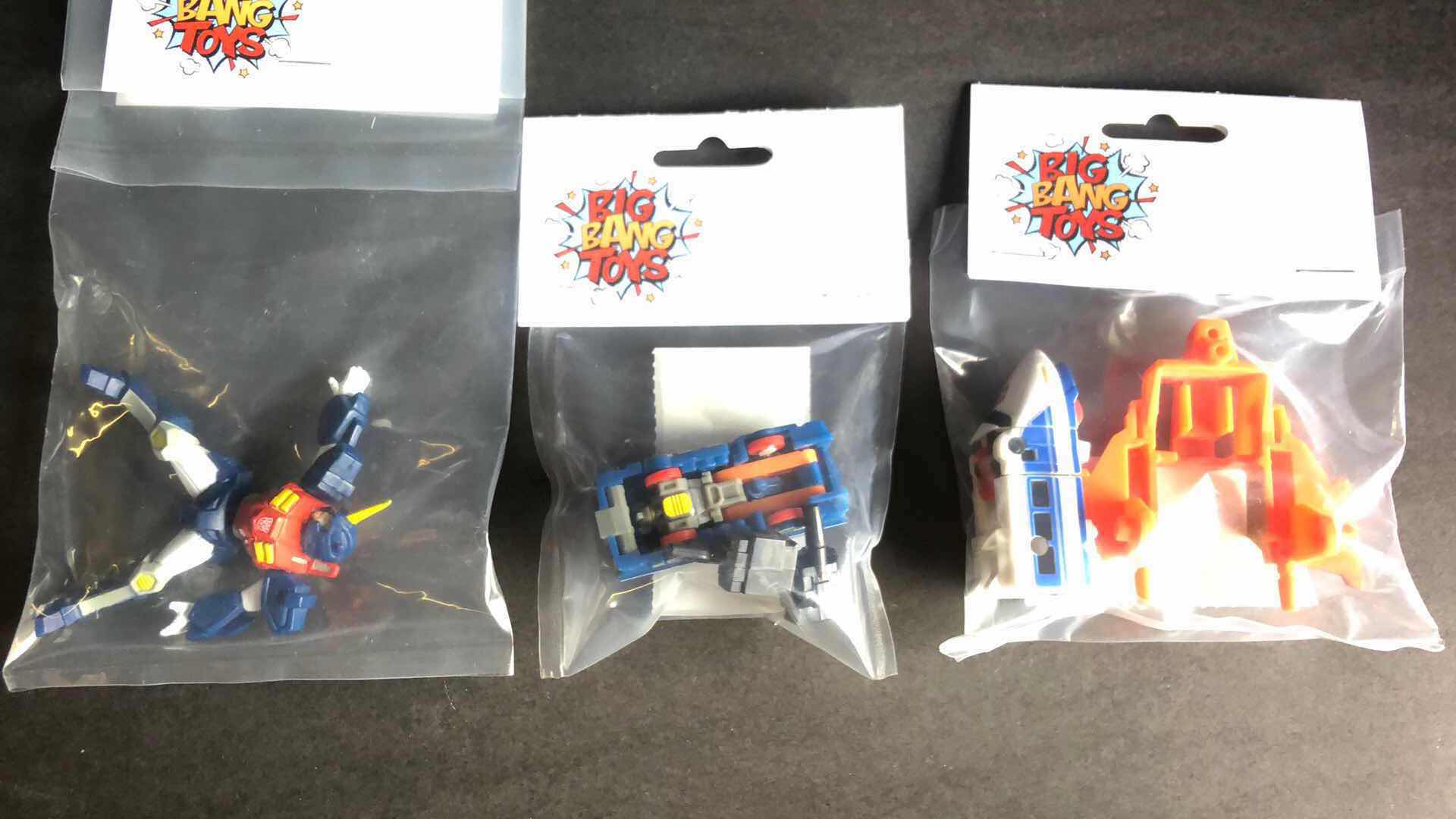 Photo 1 of ASSORTED TRANSFORMERS CARS AND FIGURES STOCKING STUFFERS $50