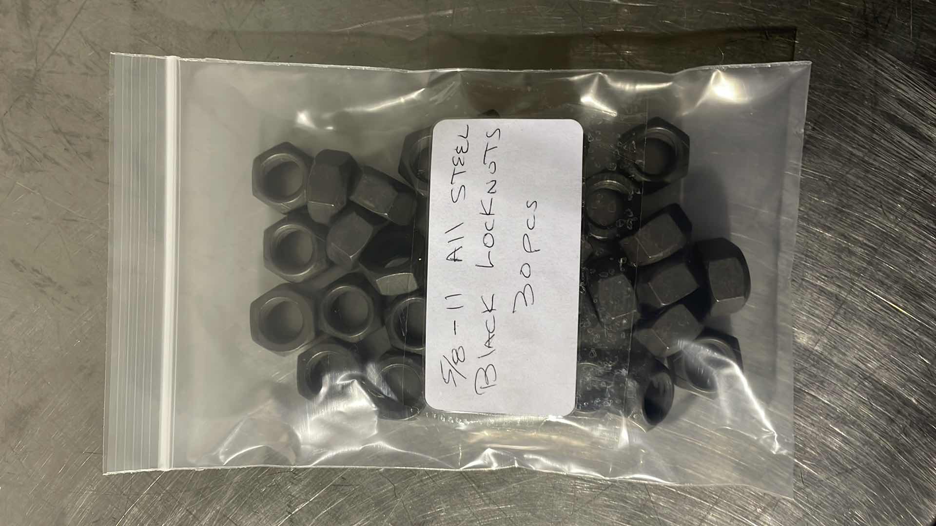 Photo 1 of 5/8”-11 ALL STEEL BLACK LOCKNUTS 30PCS