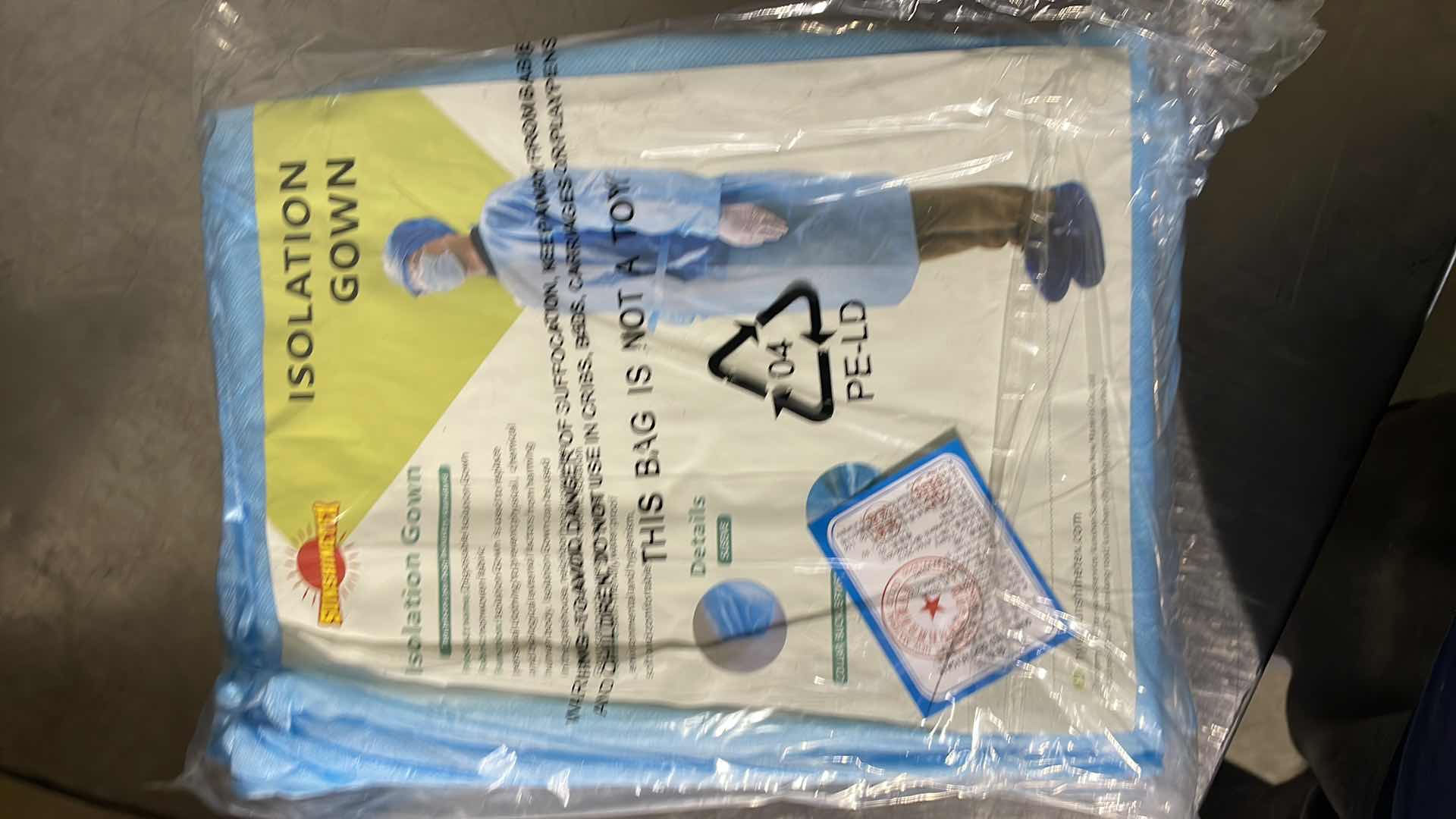 Photo 2 of DISPOSABLE ISOLATION GOWN CIVIL USE NON MEDICAL (100)