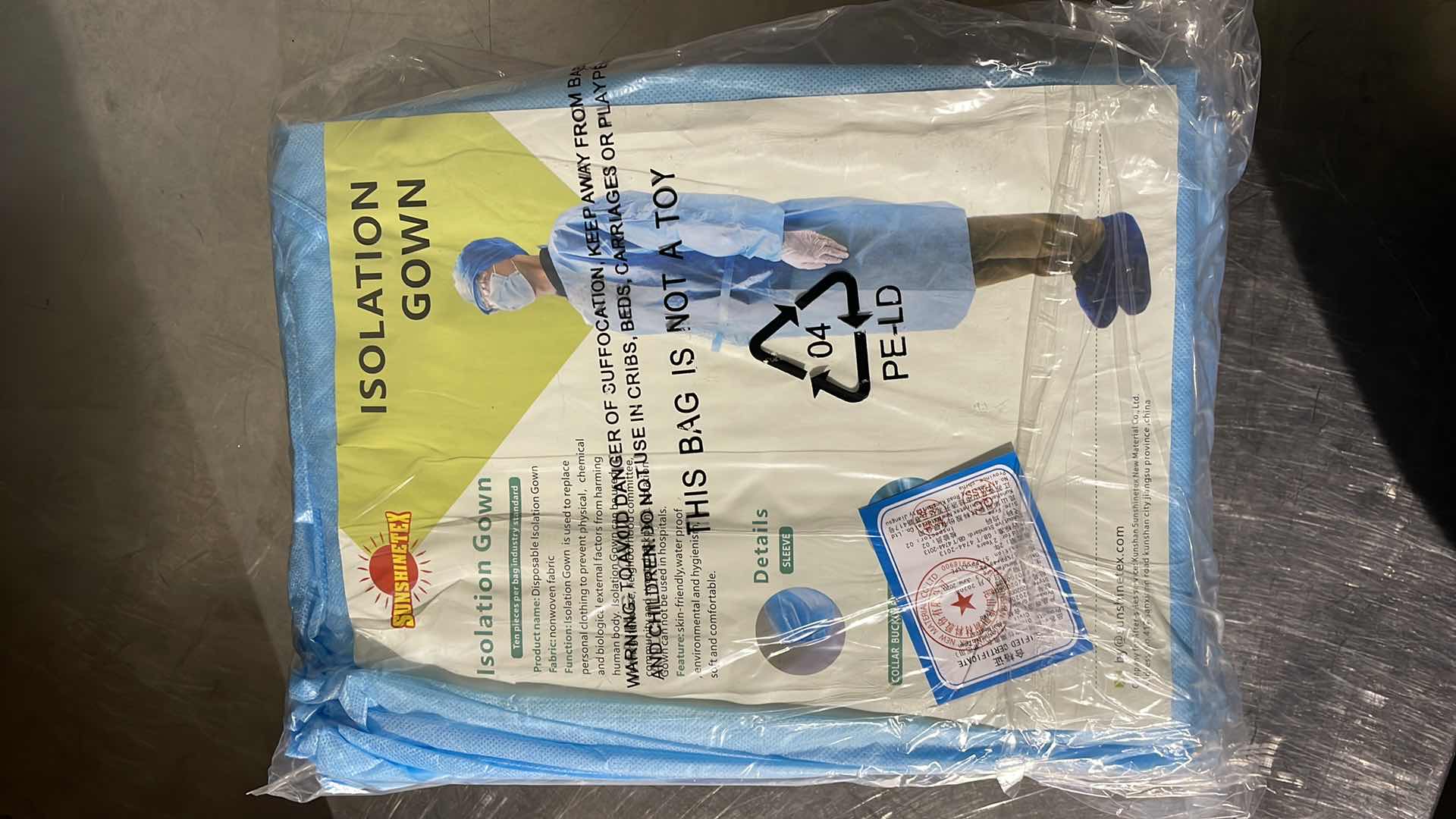 Photo 1 of DISPOSABLE ISOLATION GOWN CIVIL USE NON MEDICAL (100)