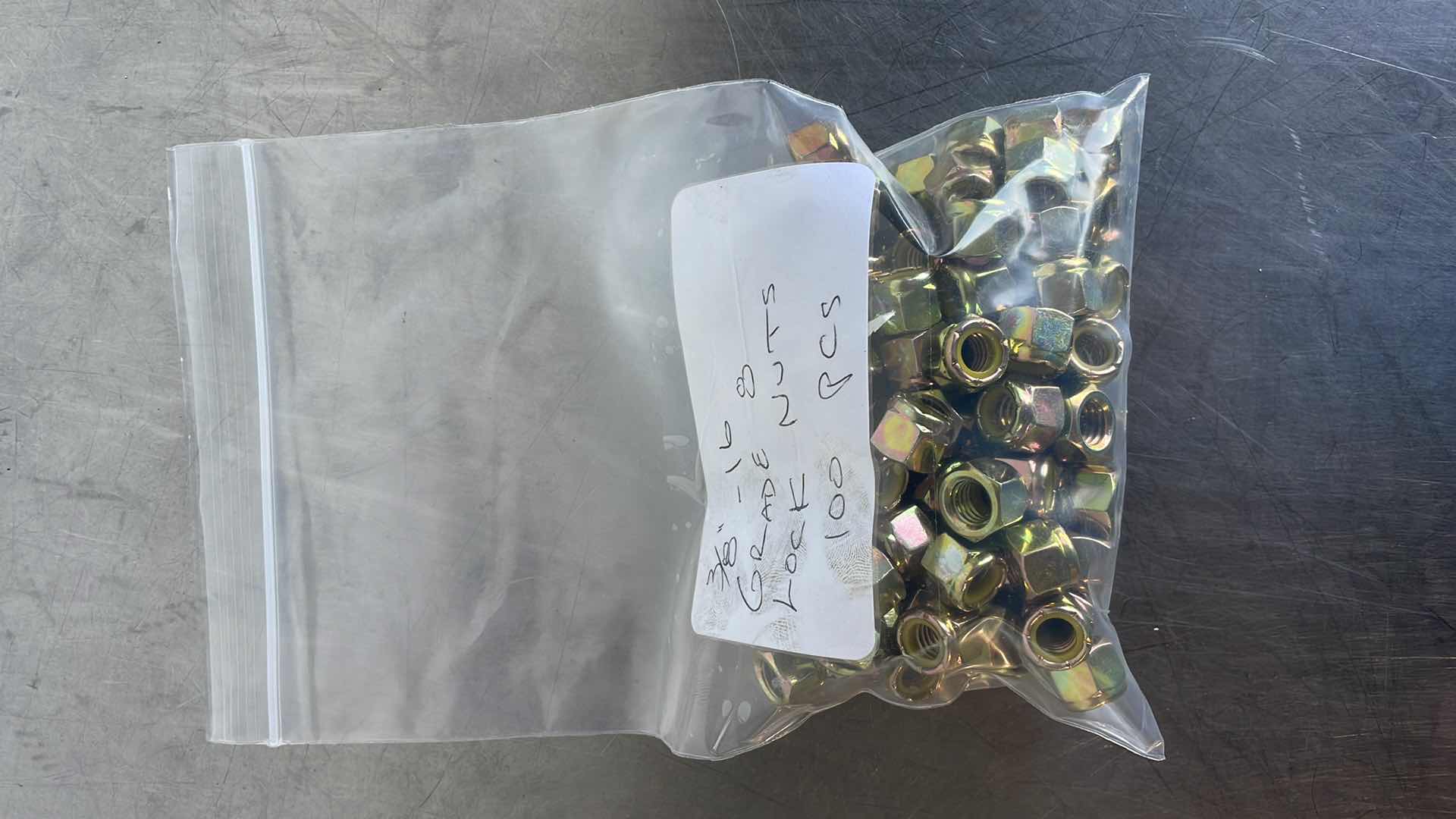 Photo 1 of 3/8”-16 GRADE 8 LOCK NUTS 100 PCS