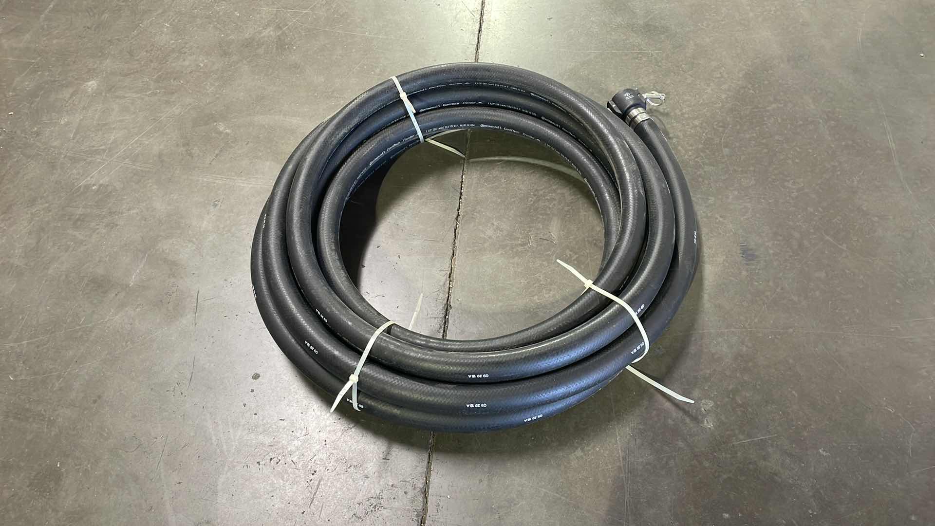 Photo 1 of CONTINENTAL CONTITECH FRONTIER 1-1/2” HOSE WITH CAMLOCK FITTINGS 25’ USA