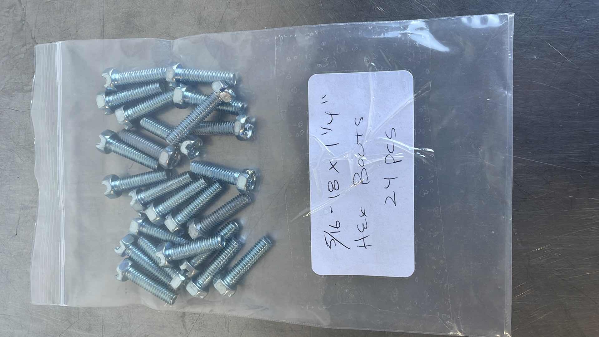 Photo 1 of 5/16-18 x 1-1/4" HEX BOLTS 24 PCS