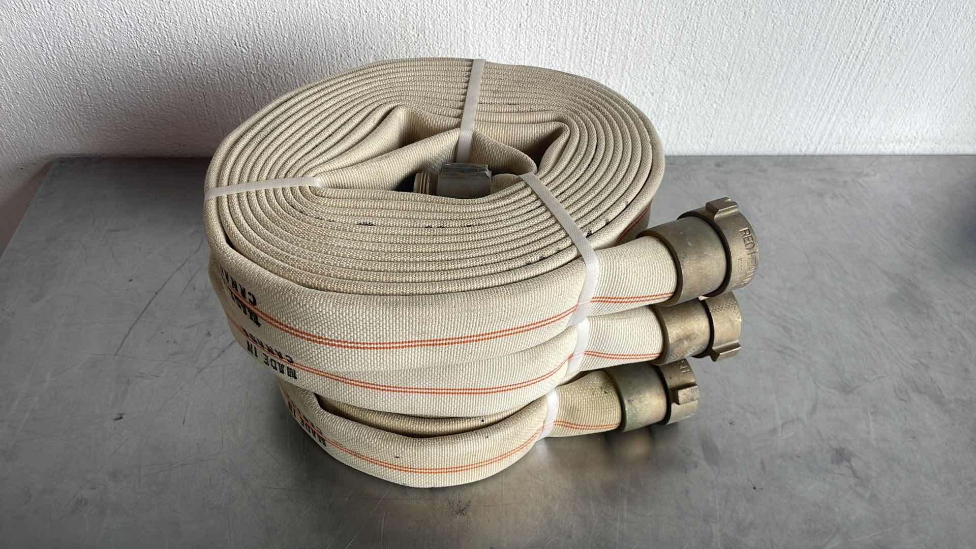 Photo 2 of RED HEAD NPSH FIRE HOSE 1-1/2” X 25’ (3) MADE IN CANADA