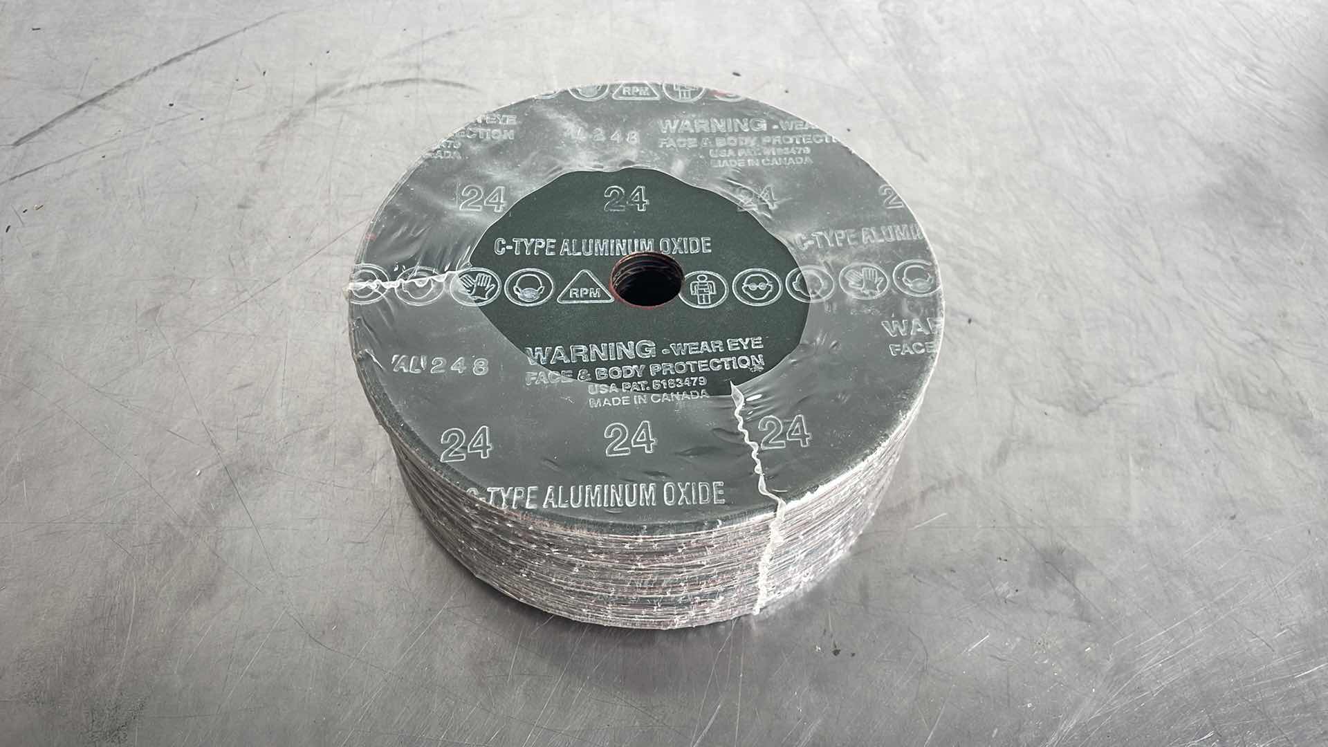 Photo 2 of 7” x7/8” 24 GRIT TYPE C ABRASIVE DISCS (25)