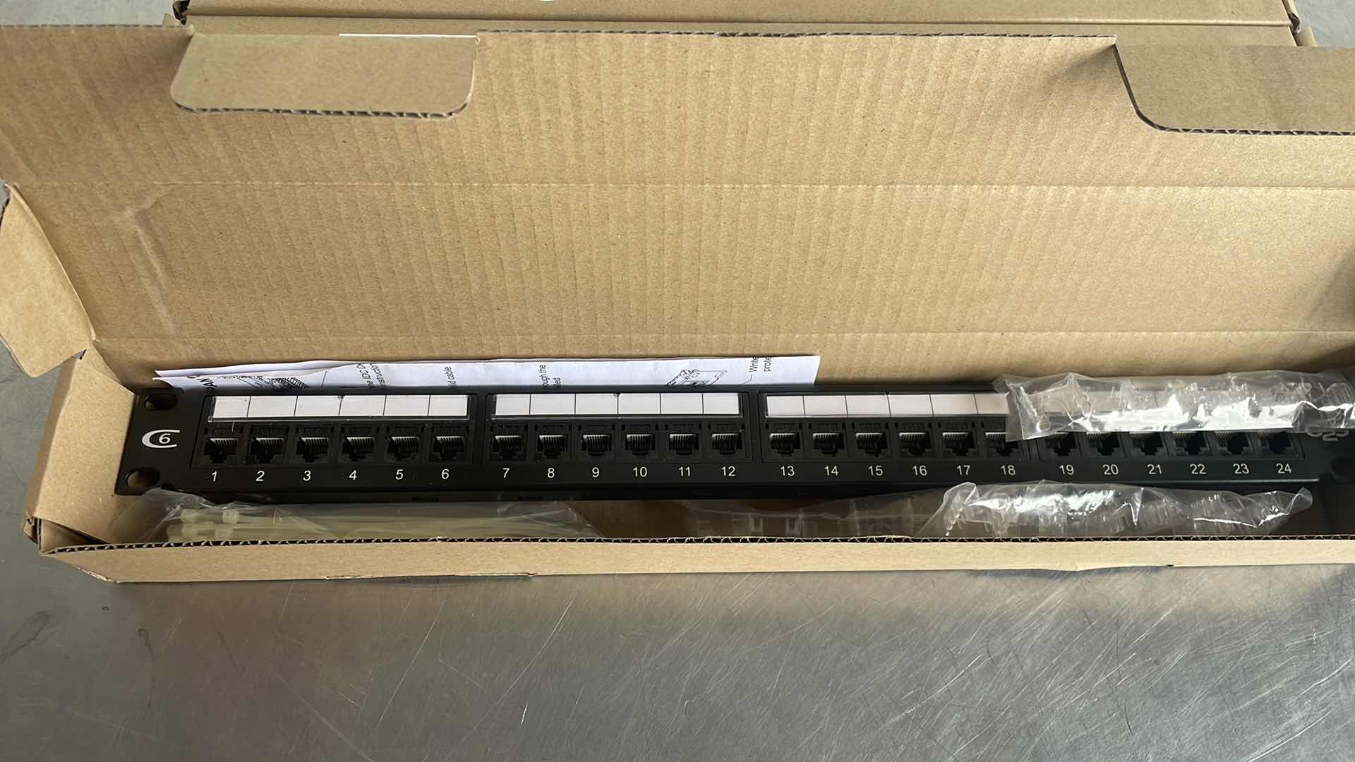 Photo 3 of C2G Cables To Go 37050 24 PORT CAT6 110- TYPE PATCH PANEL BLACK 19" (7)