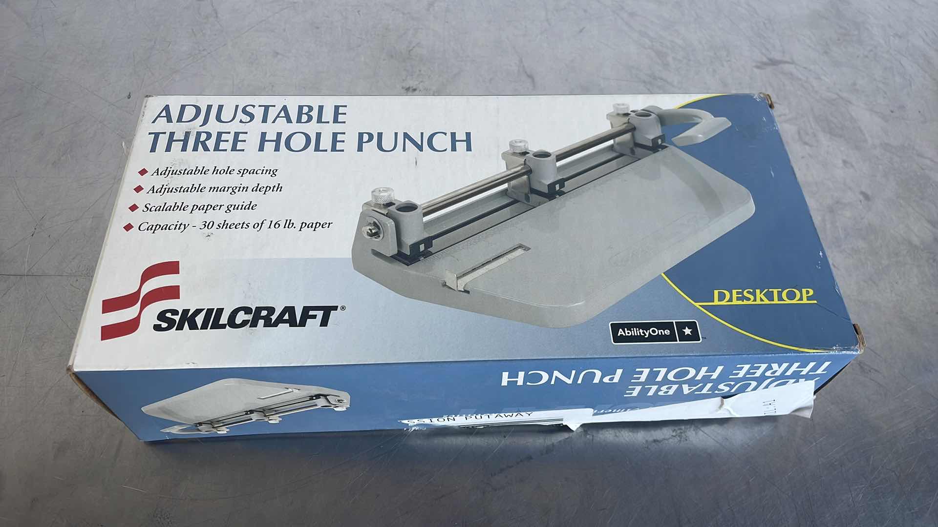 Photo 1 of ADJUSTABLE 3 HOLE PUNCH