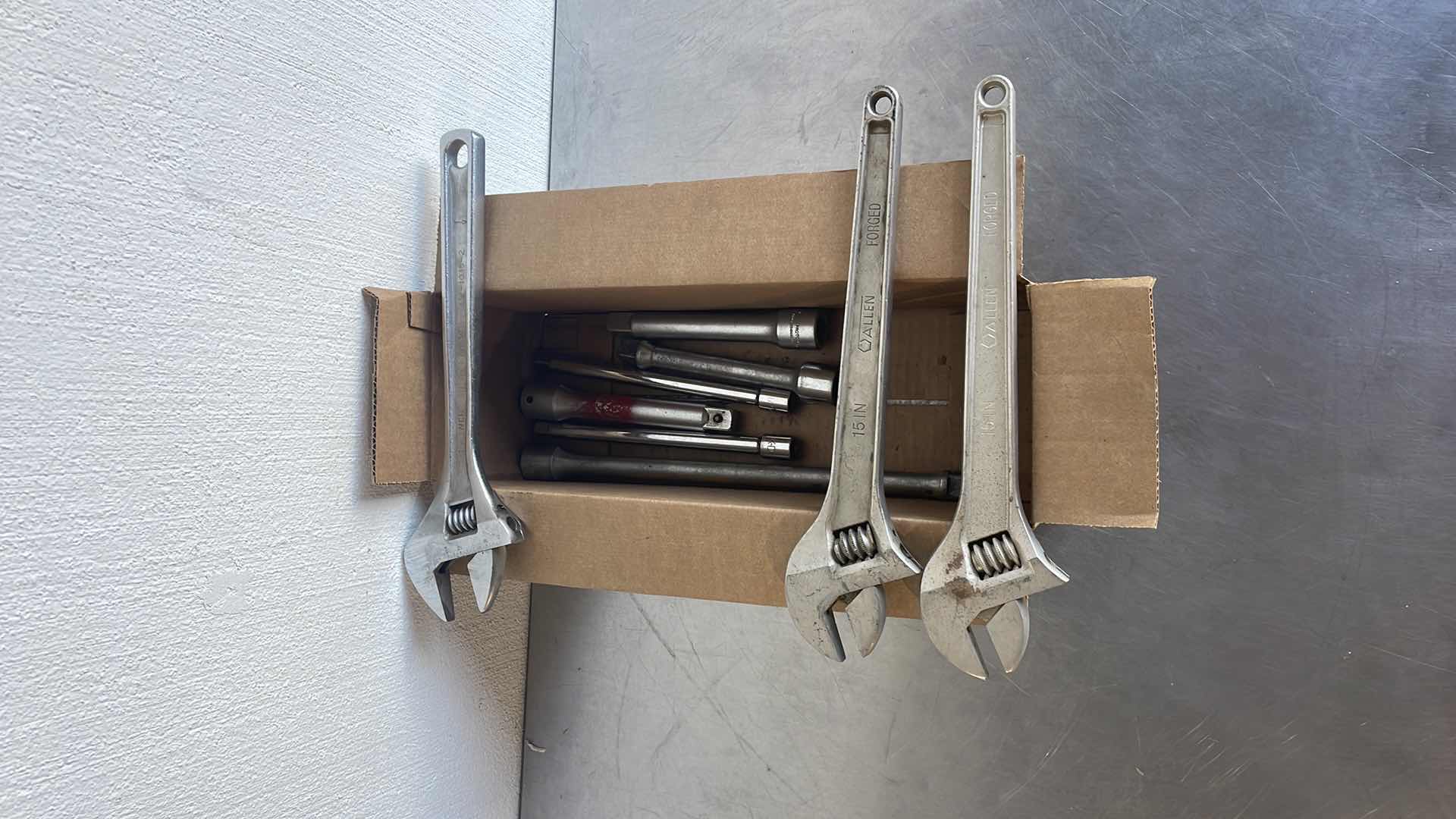 Photo 1 of 15” ADJUSTABLE WRENCHES(3) & 3/4” & 1/2” DRIVE EXTENSIONS