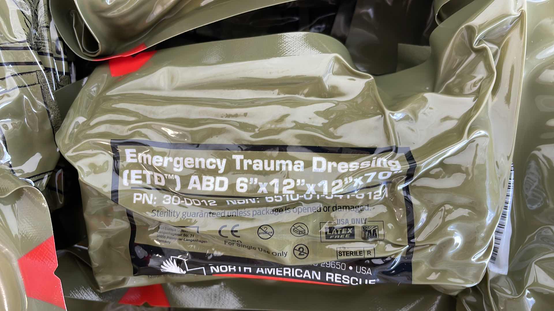 Photo 2 of EMERGENCY TRAUMA DRESSING 6” X 12” X 70” (25) EXP 6/23