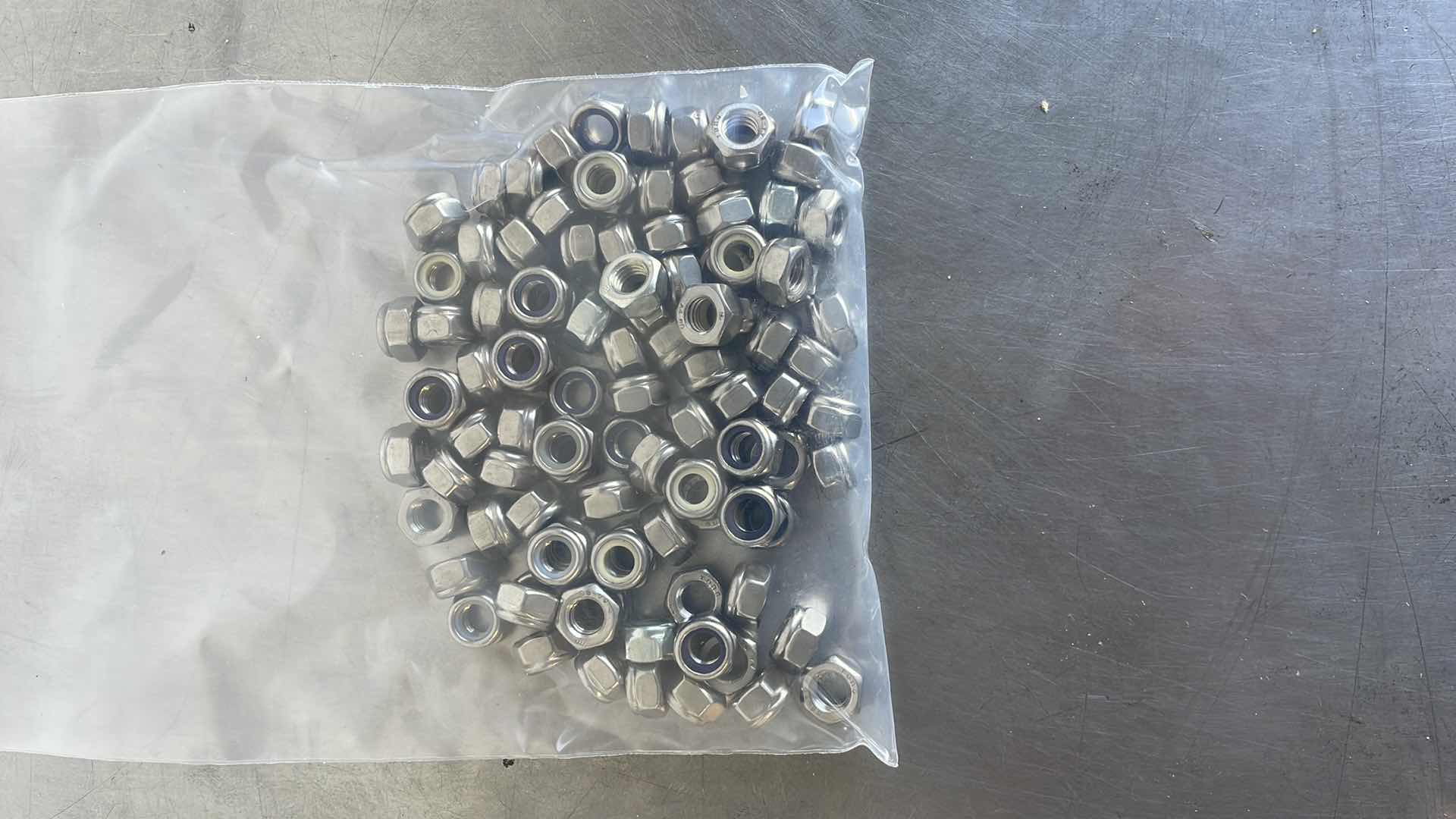 Photo 1 of M8 - 1.25 316 SS LOCKNUT 100PCS