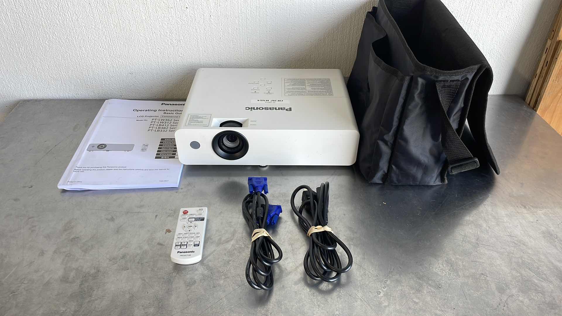 Photo 1 of PANASONIC LCD PROTECTOR MODEL PT-LW312 WITH CASE