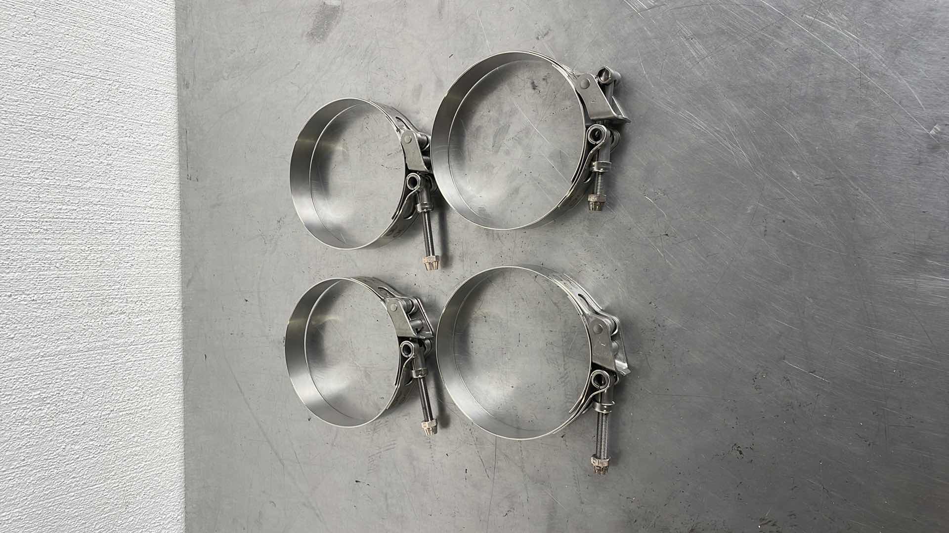 Photo 1 of PIPE HOSE CLAMPS 5” - 5-1/2” (4)