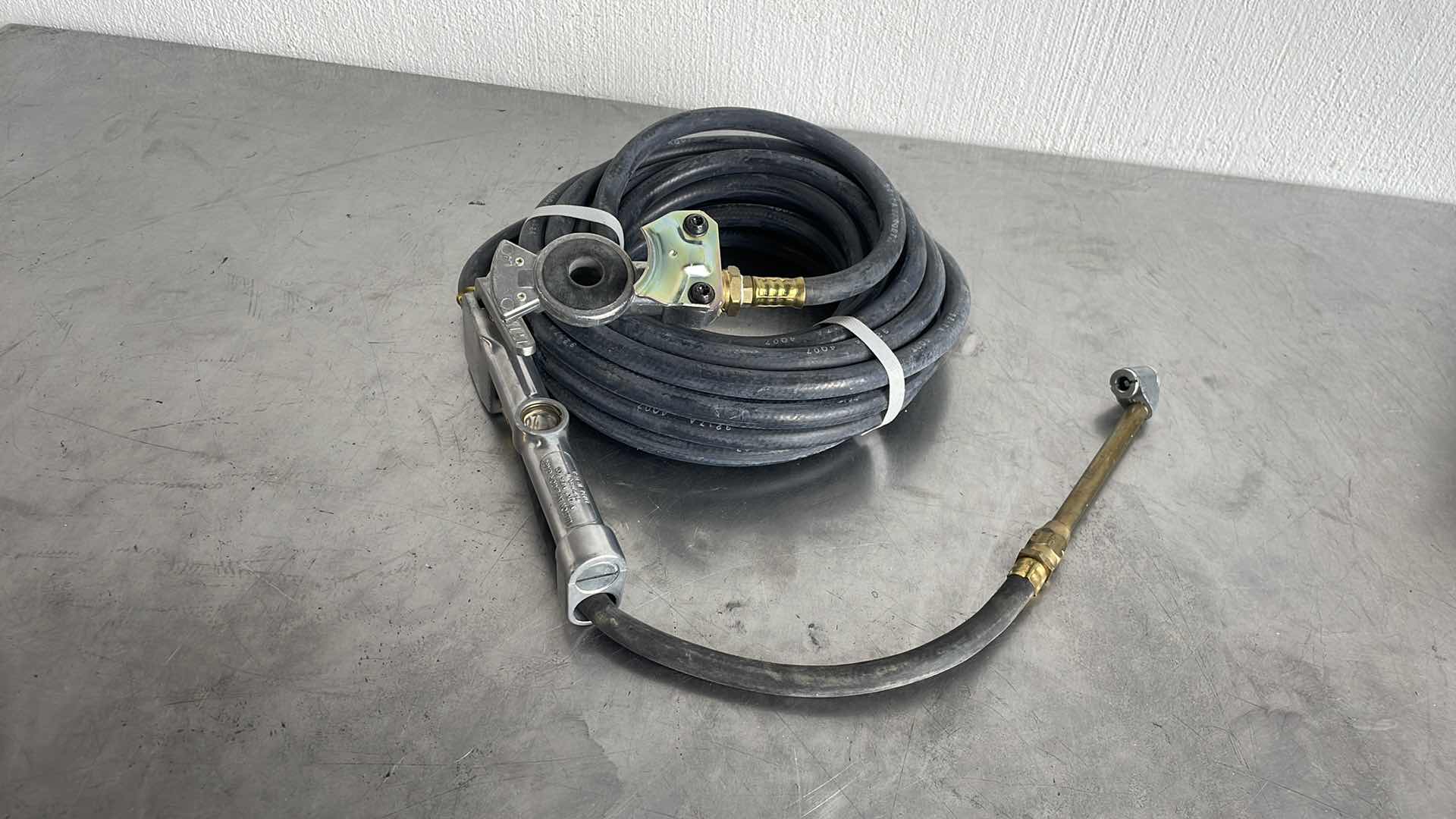 Photo 1 of MILTON S-506 INFLATOR GAUGE W/ GOODYEAR 200PSI HOSE & PHILLIPS GLADHAND