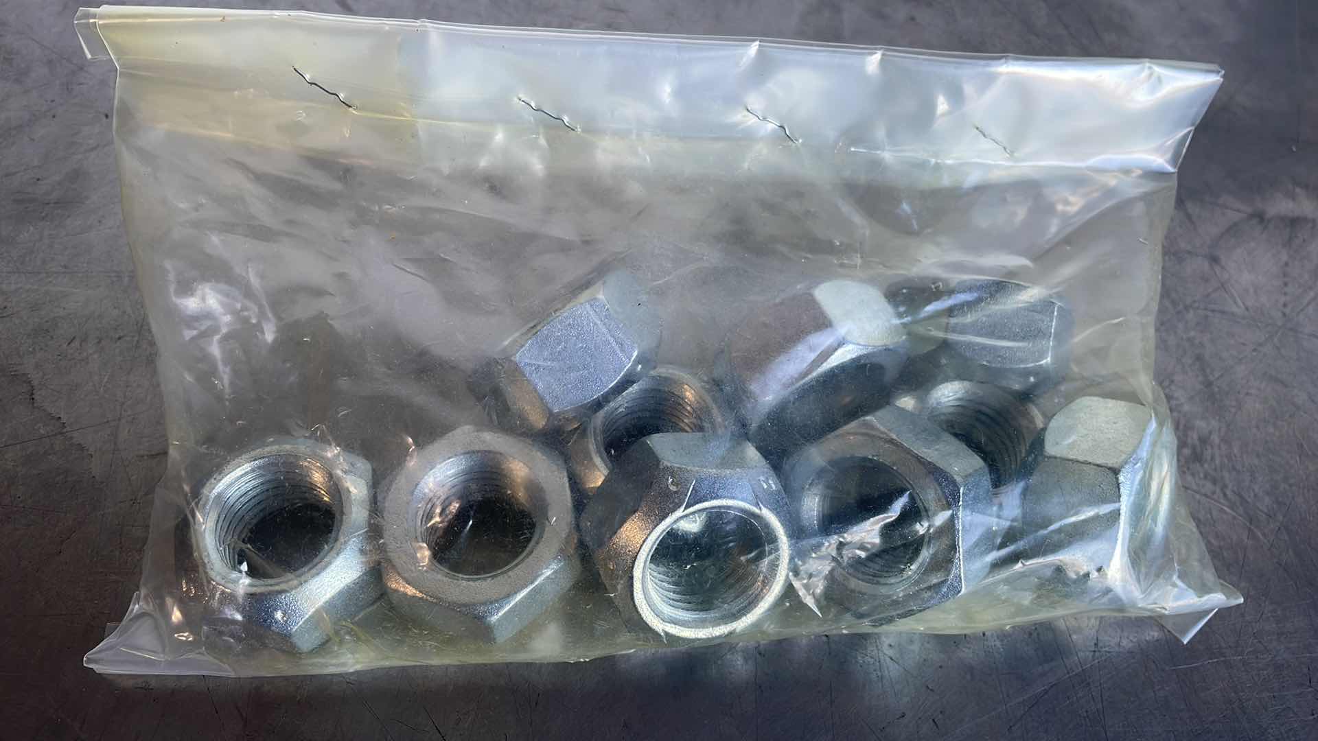 Photo 1 of 7/8”-9 ALL STEEL LOCK NUTS 10PCS