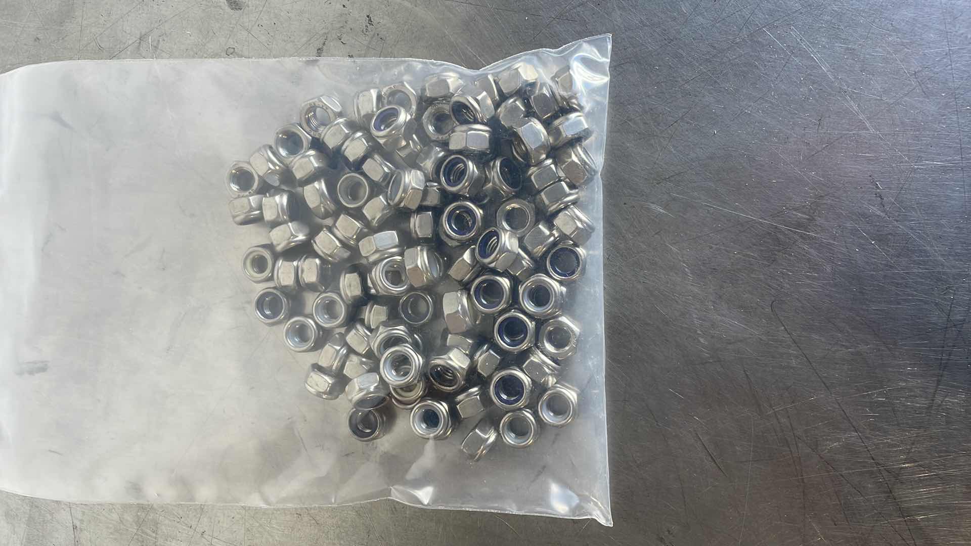 Photo 1 of M8 - 1.25 316 SS LOCKNUT 100PCS