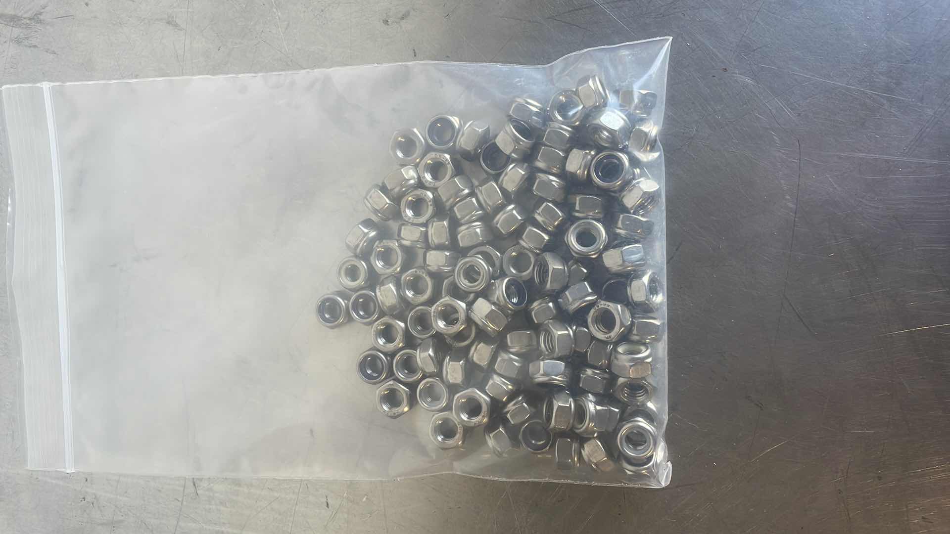 Photo 1 of M8 - 1.25 316 SS LOCKNUT 100PCS