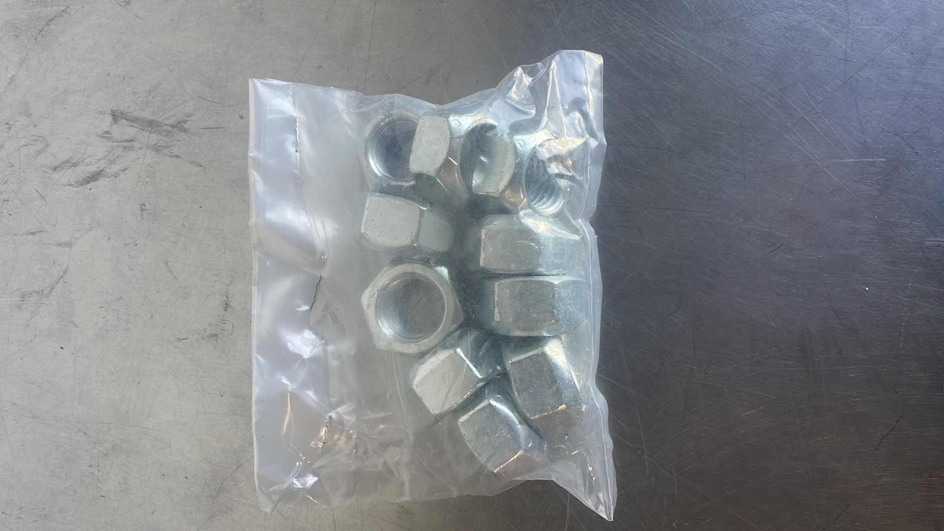 Photo 1 of 7/8”-9 ALL STEEL LOCK NUTS 10PCS