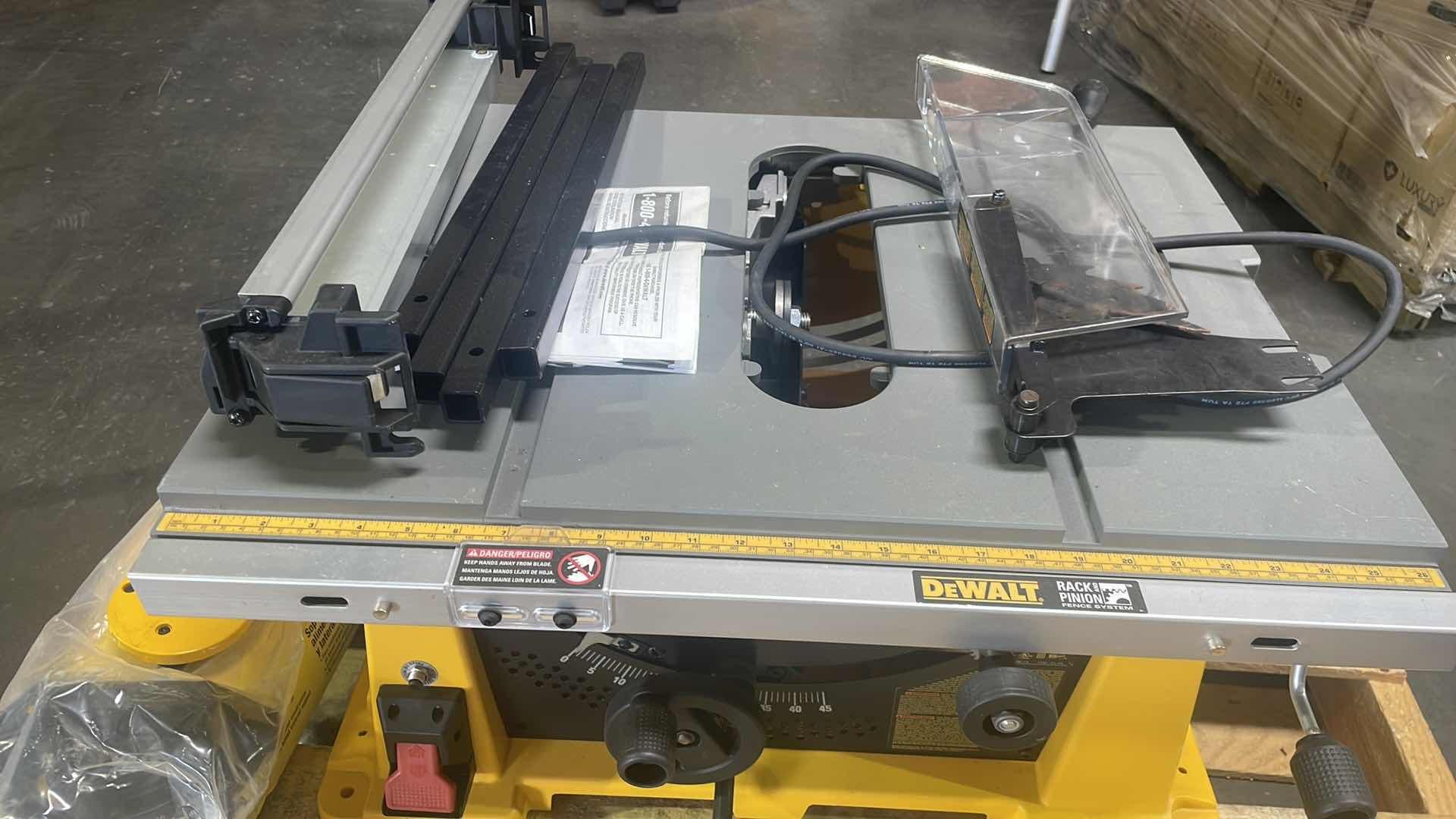 Photo 8 of DEWALT 10” TABLE SAW DW744 WITH STAND AND OUTFEED AND SIDE SUPPORT