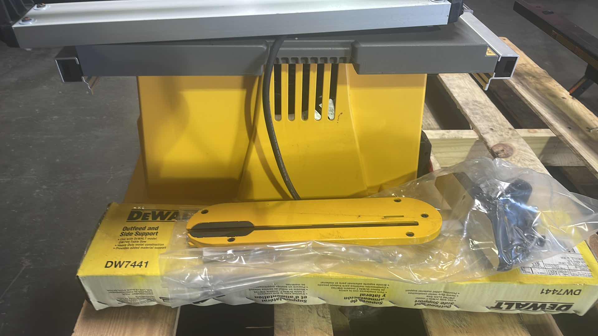 Photo 4 of DEWALT 10” TABLE SAW DW744 WITH STAND AND OUTFEED AND SIDE SUPPORT