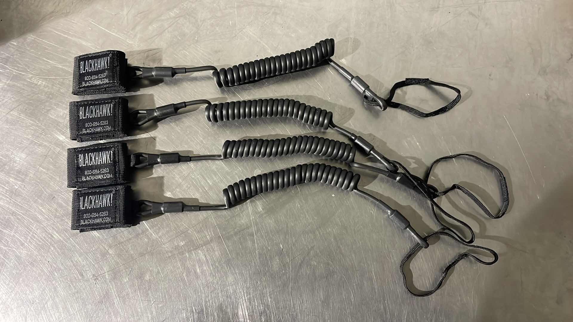 Photo 2 of NEW BLACKHAWK COILED
TACTICAL PISTOL LANYARDS
90TPLIBK