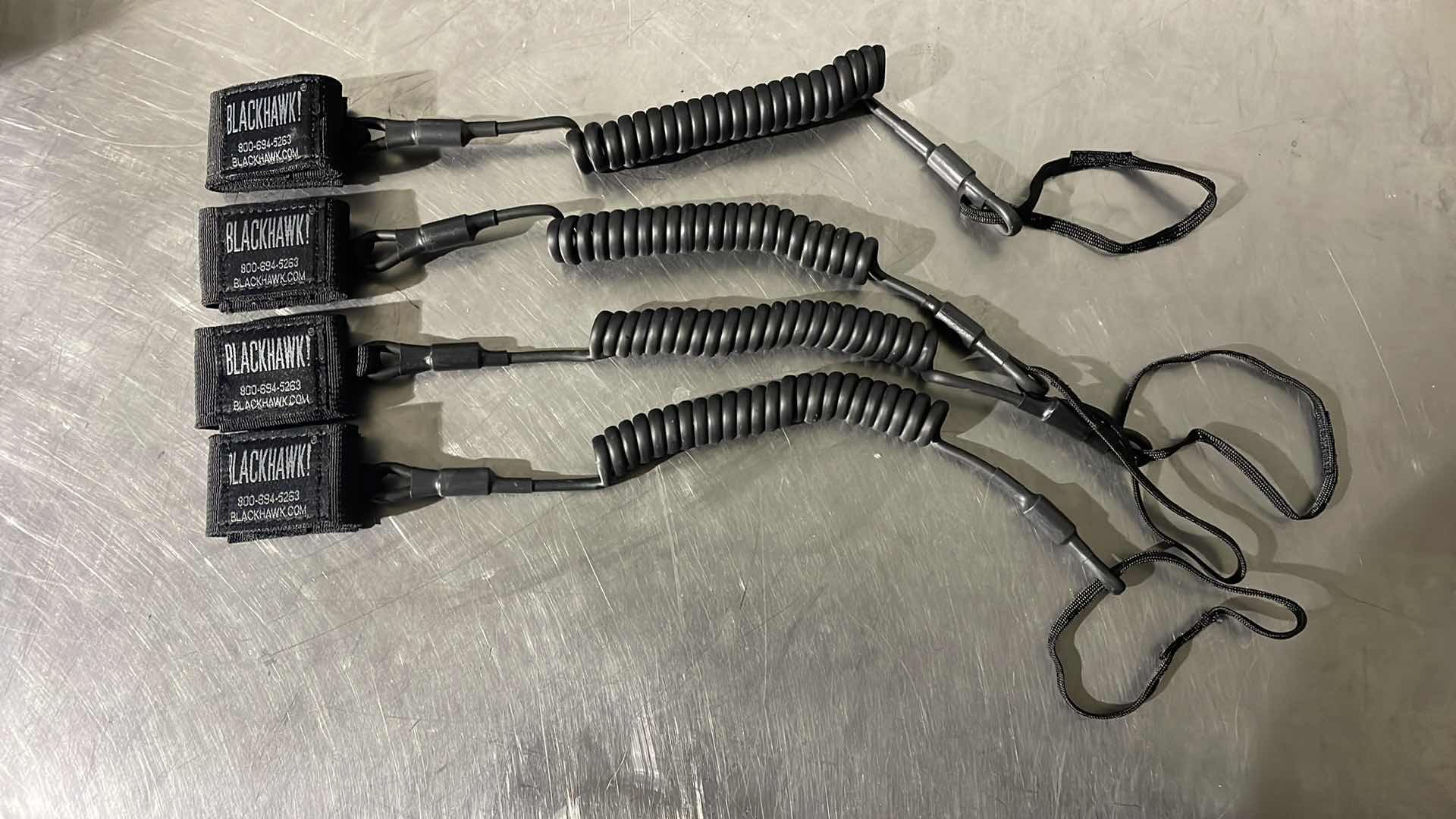 Photo 1 of NEW BLACKHAWK COILED
TACTICAL PISTOL LANYARDS
90TPLIBK