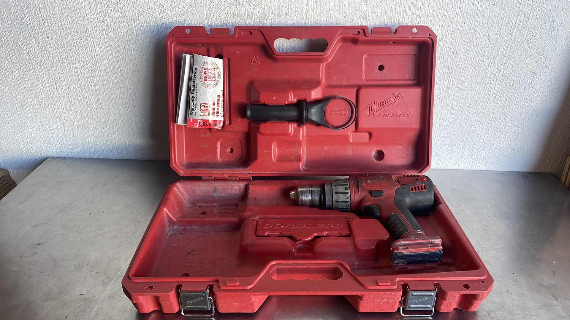 Photo 1 of MILWAUKEE CORDLESS HEAVYDUTY HAMMER DRILL 28V IN CASE