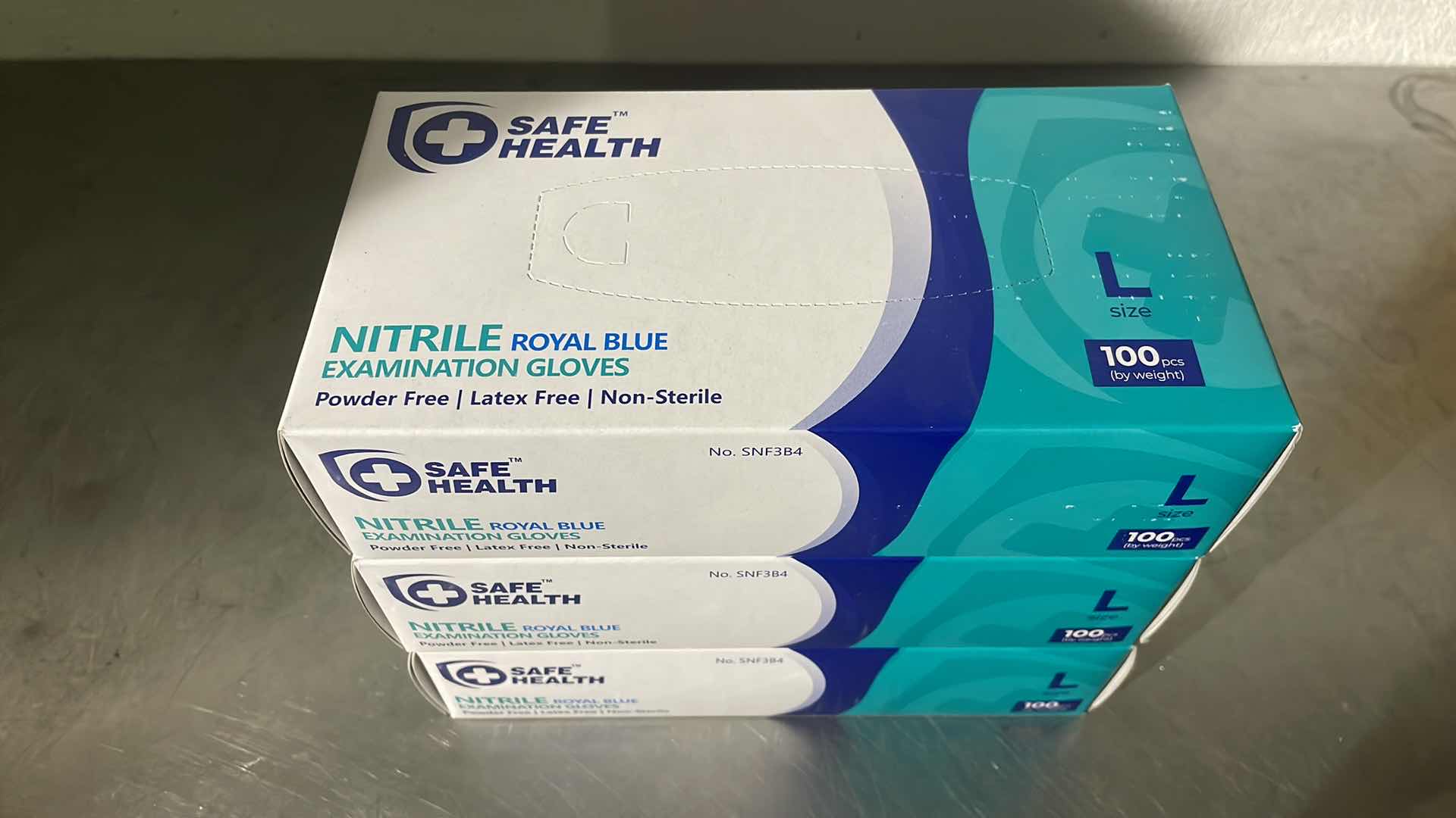 Photo 1 of SAFE HEALTH NITRILE EXAM DISPOSABLE GLOVES, LATEX FREE, POWDER FREE, BLUE, BOX OF 100, LARGE, TEXTURED, 3.5 MIL, MEDICAL GRADE, FOOD, TATTOO, NURSING, CLEANING, SCHOOL (3 BOXES)