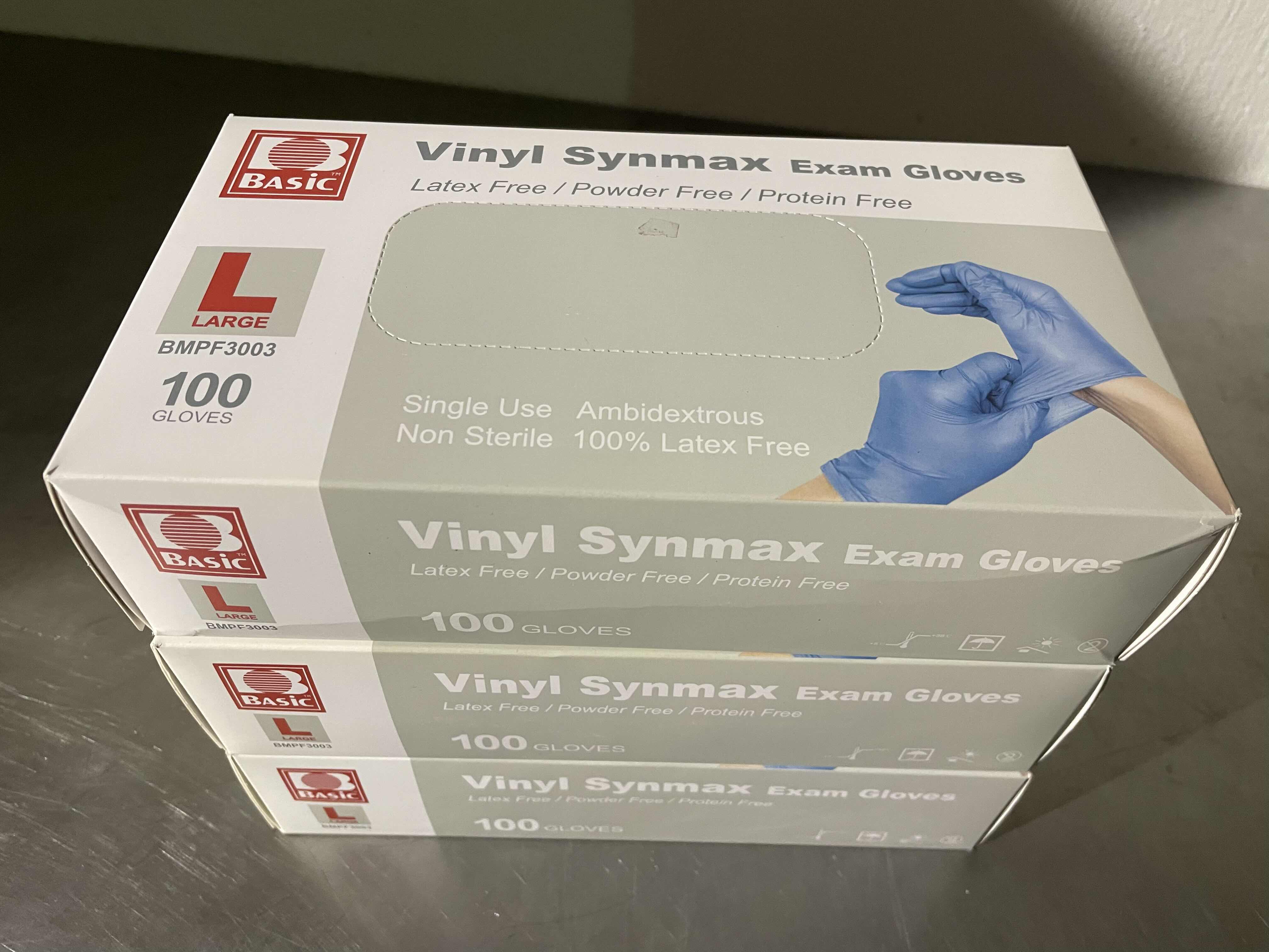 Photo 1 of BASIC SYNMAX SYNTHETIC VINYL EXAM GLOVE,POWDER FREE,LARGE,100/BOX,BLUE,BMPF-3003 (3 BOXES) EXP 3/26