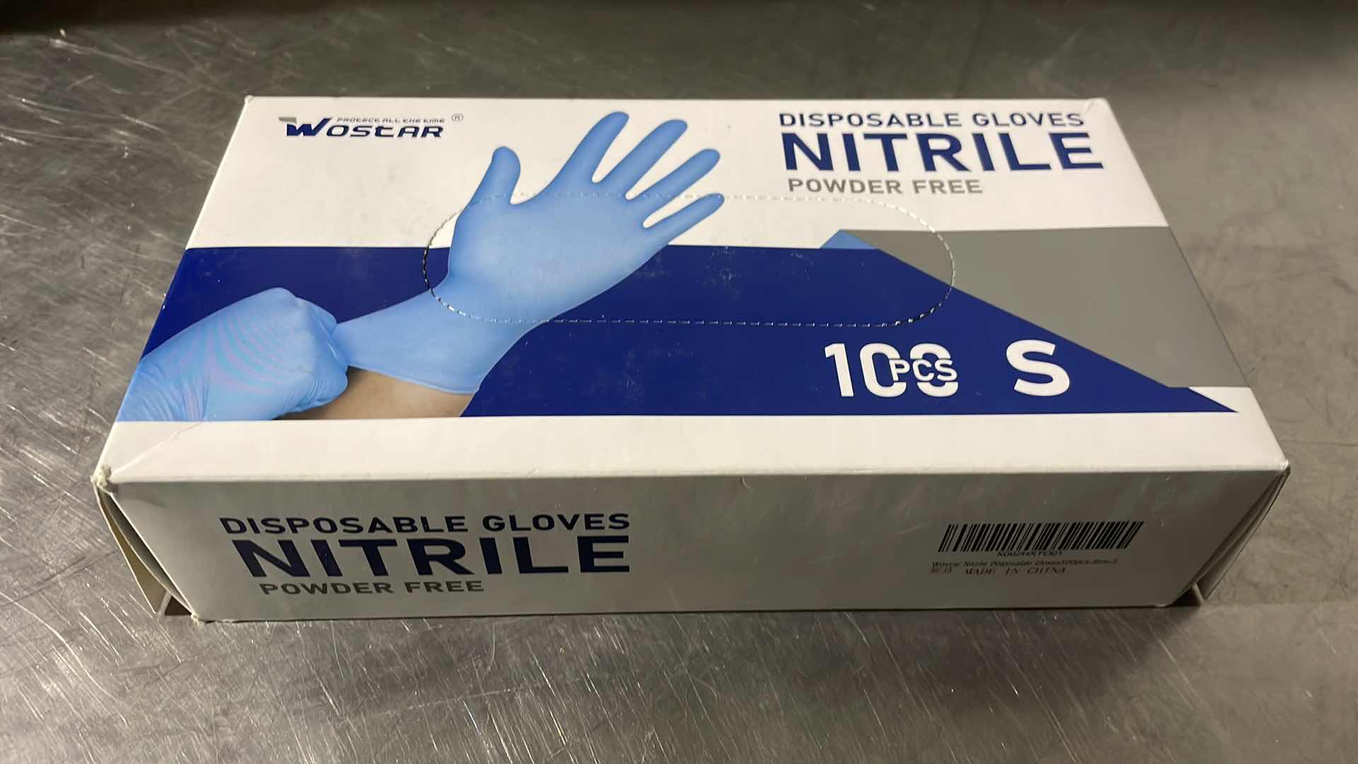 Photo 1 of WOSTAR NITRILE DISPOSABLE GLOVES 4MIL POWDER LATEX FREE DISPOSABLE NON-STERILE NITRILE EXAM GLOVES SMALL