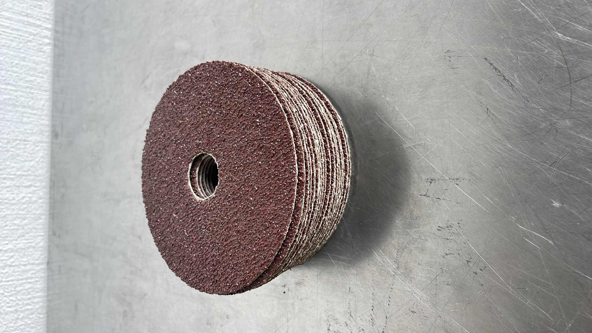 Photo 1 of ALUMINUM OXIDE RESIN FIBER 4-INCH RESIN FIBER SANDING DISCS CENTER HOLE 24 GRIT SANDING DISC FOR ANGLE GRINDER (22)