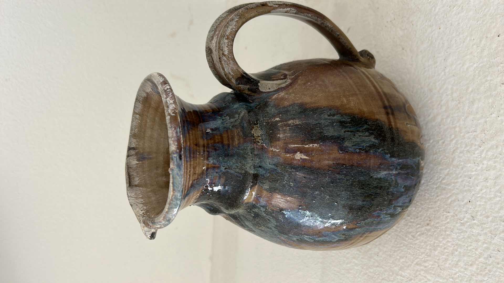 Photo 3 of SIGNED GLAZED POTTERY - PITCHER 9.5 inches.